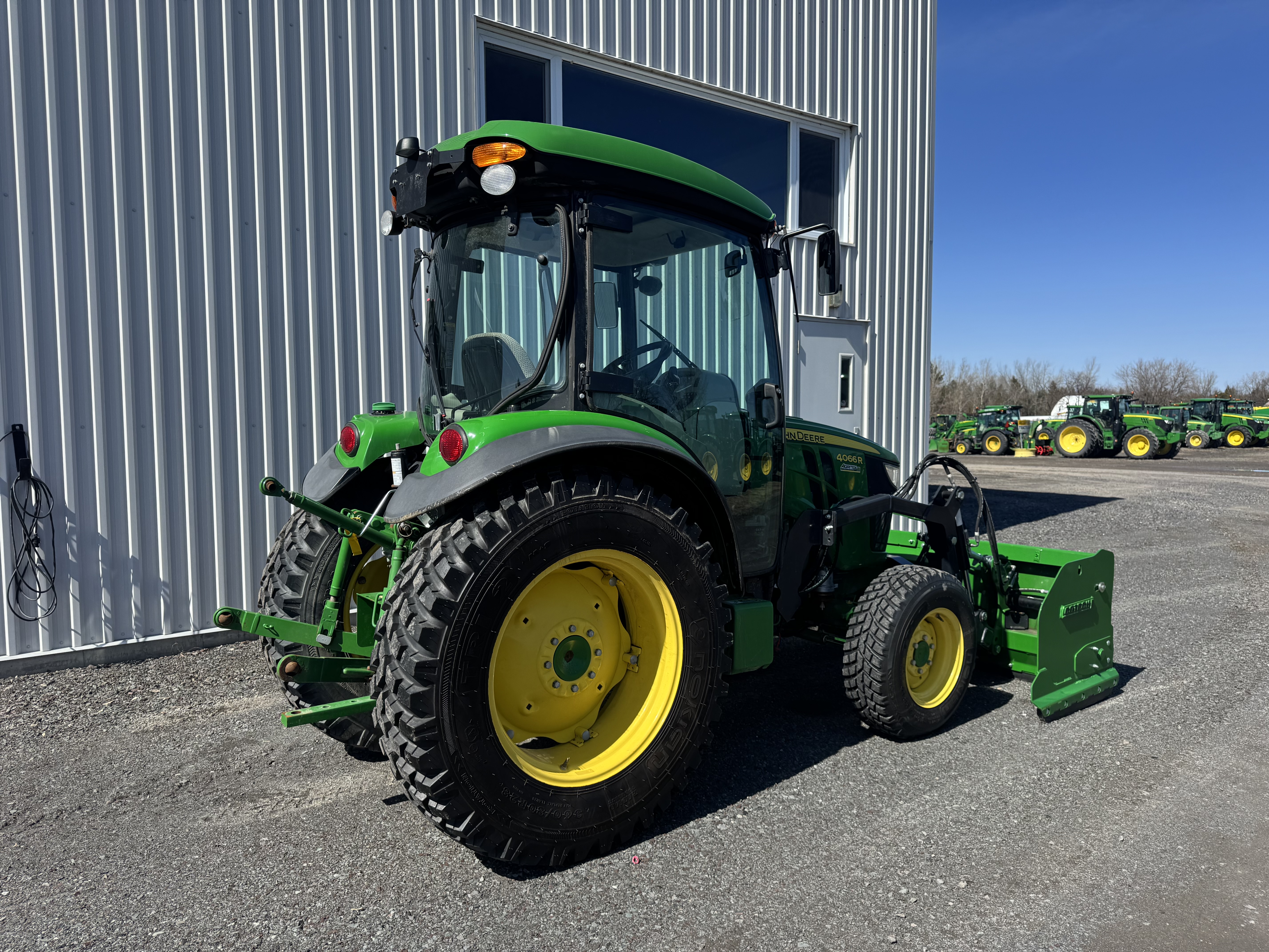 John Deere 4066R GRATTE NOKIAN  