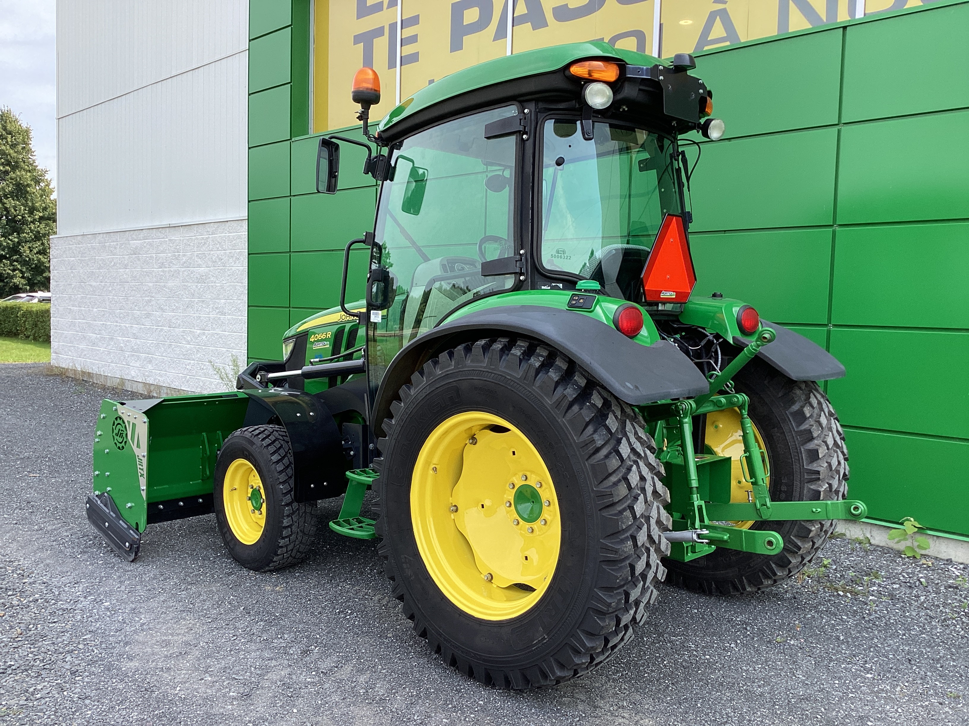 John Deere 4066R GRATTE NOKIAN 