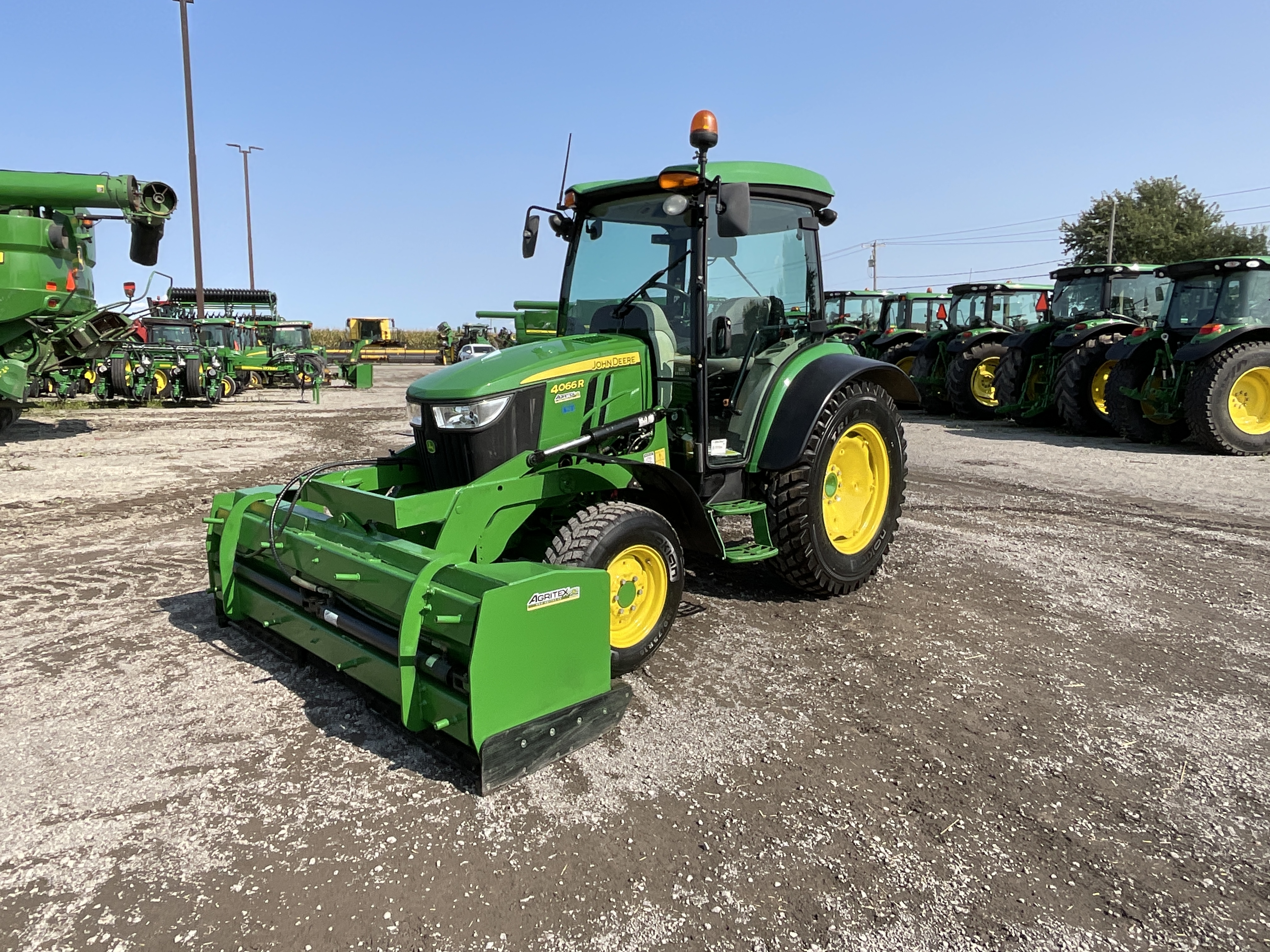 John Deere 4066R GRATTE NOKIAN 