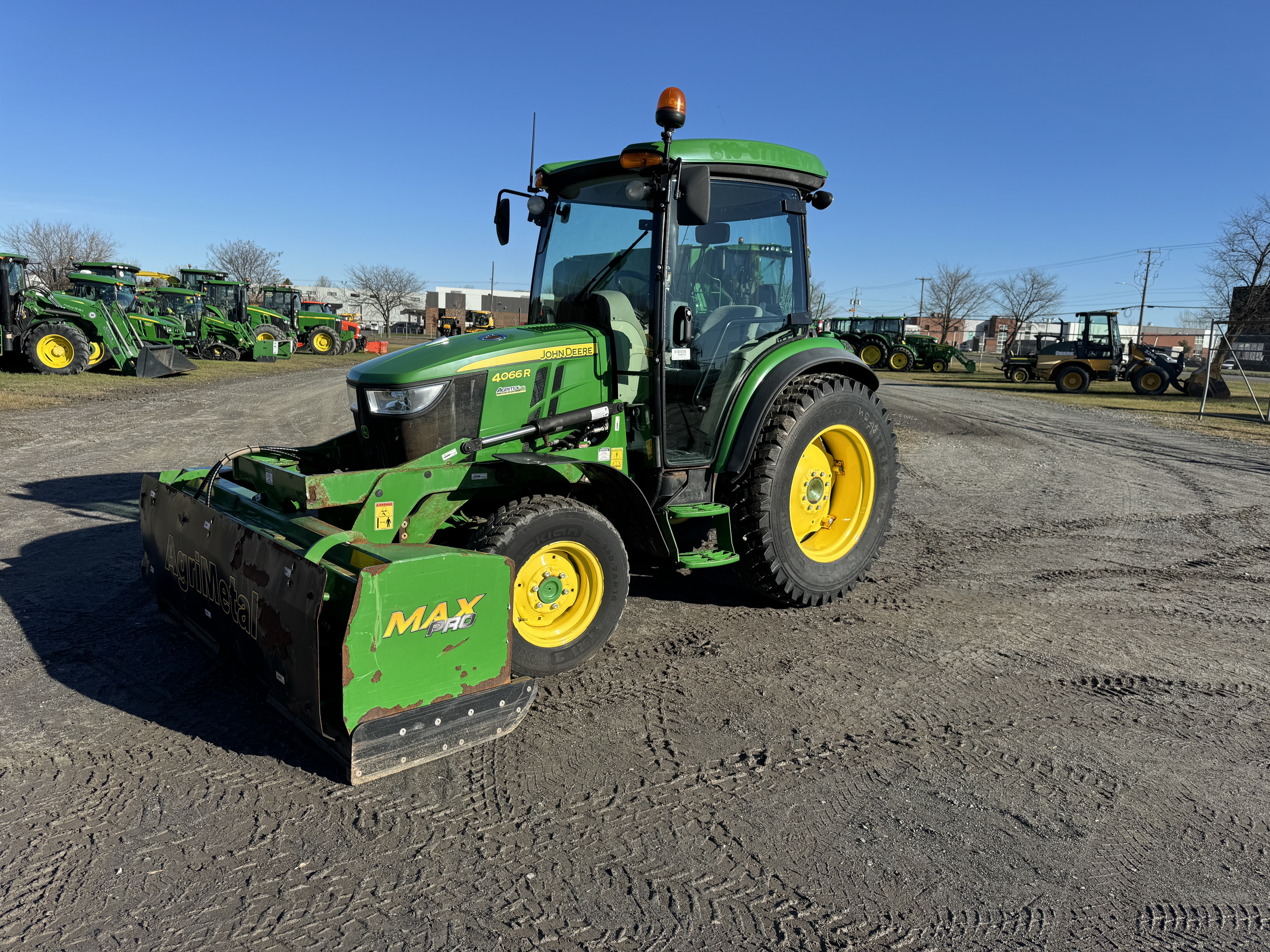 John Deere 4066R GRATTE NOKIAN  
