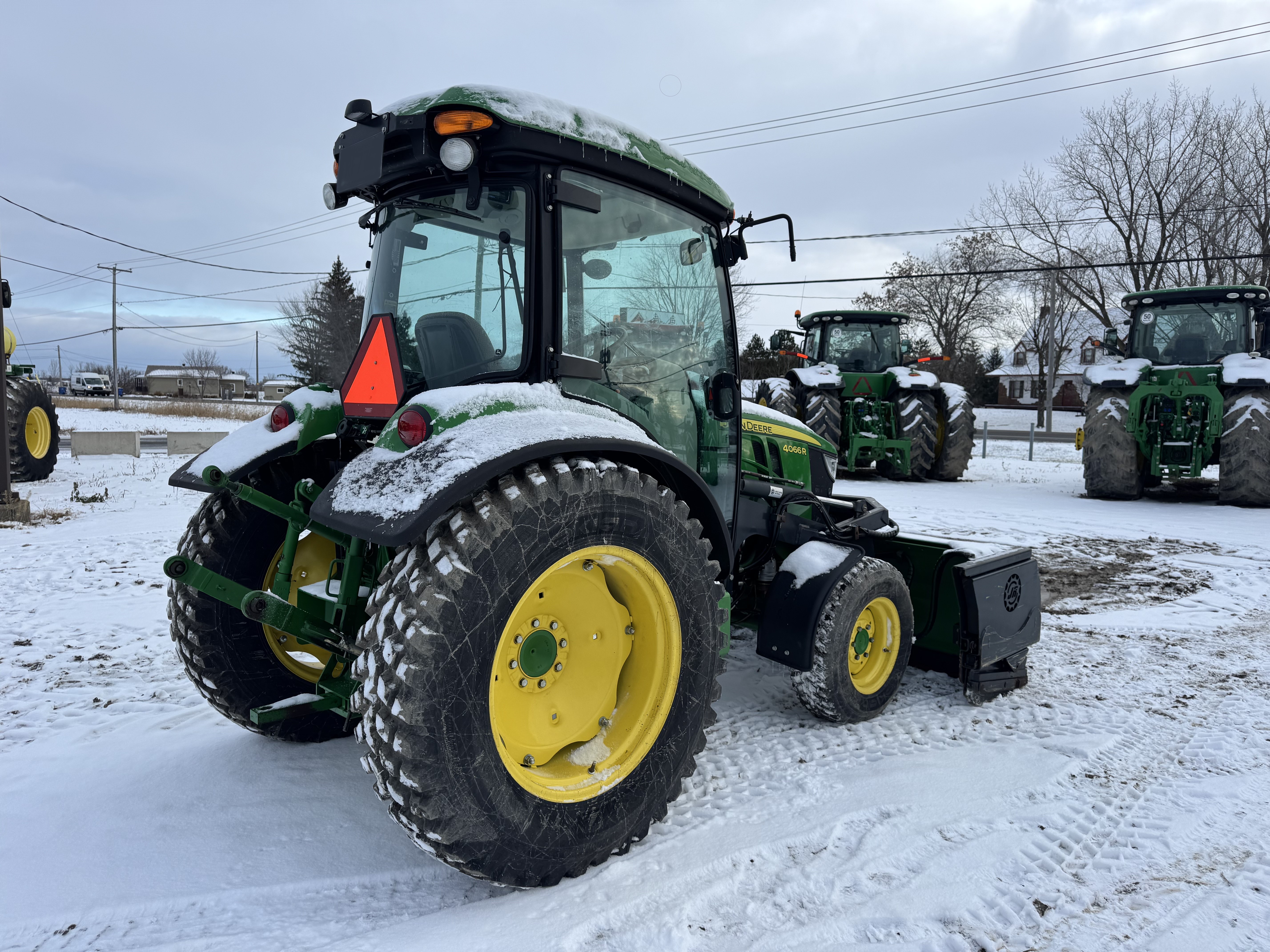 John Deere 4066R GRATTE NOKIAN    