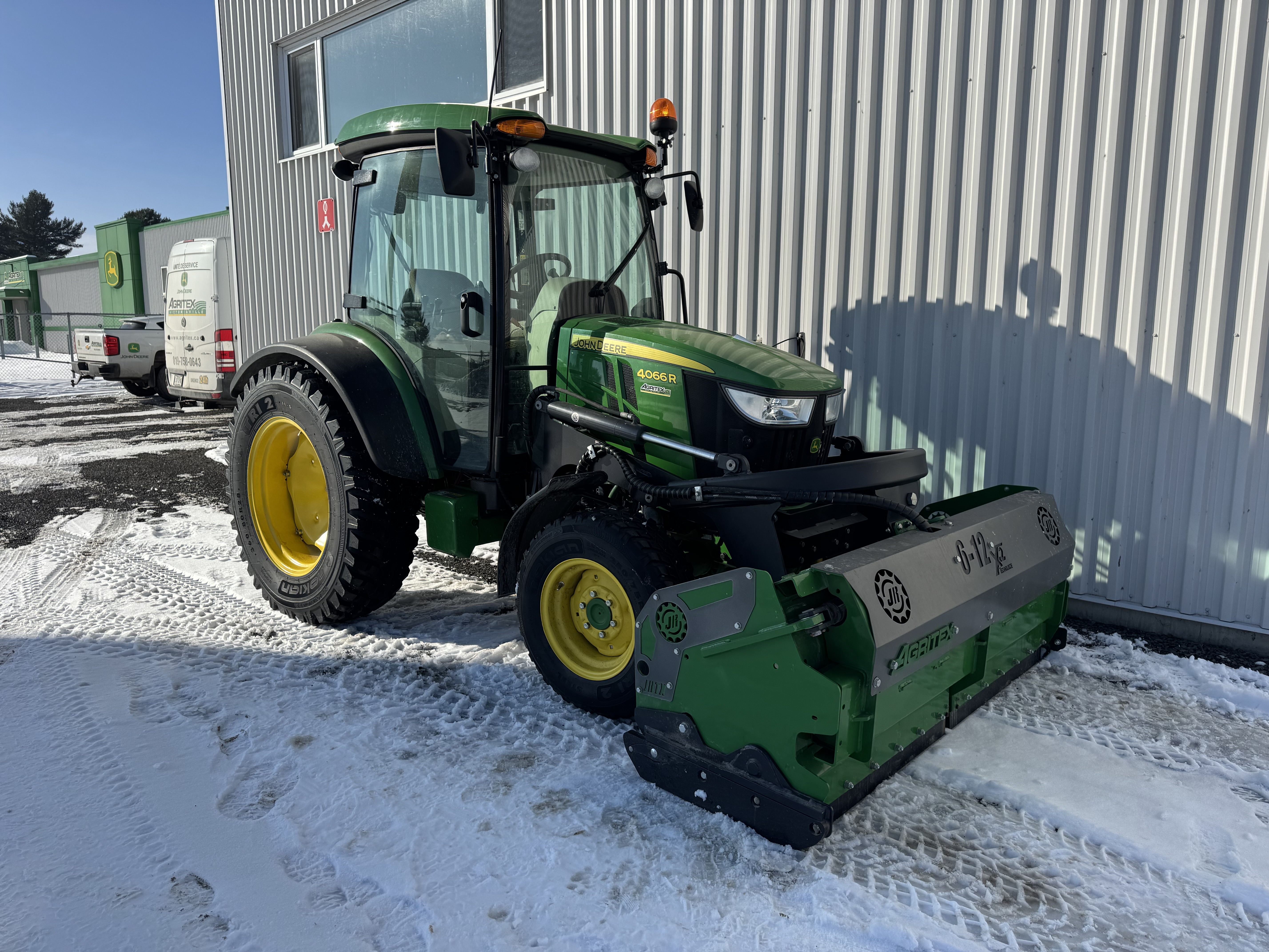 John Deere 4066R GRATTE NOKIAN    