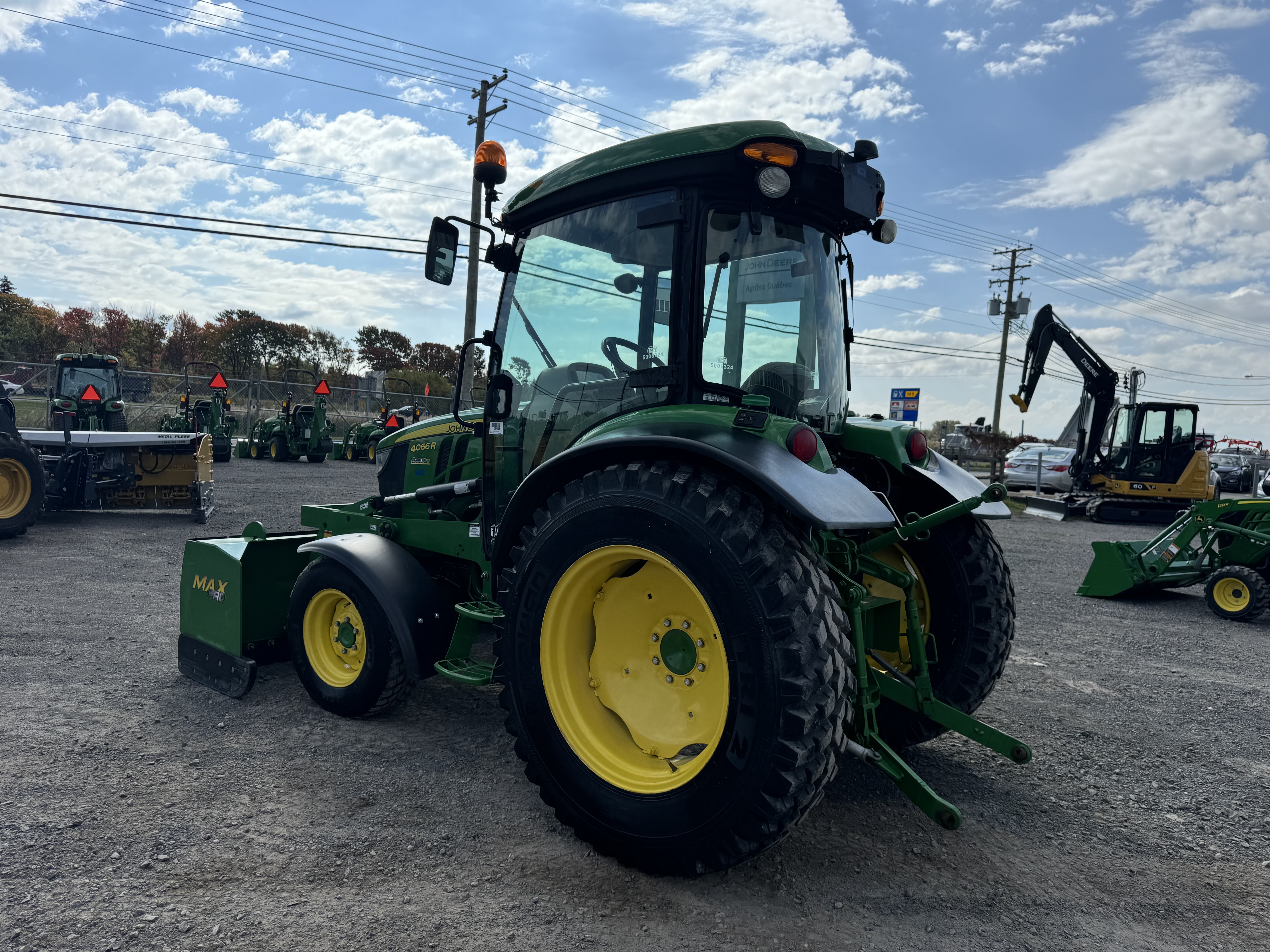 John Deere 4066R GRATTE NOKIAN 