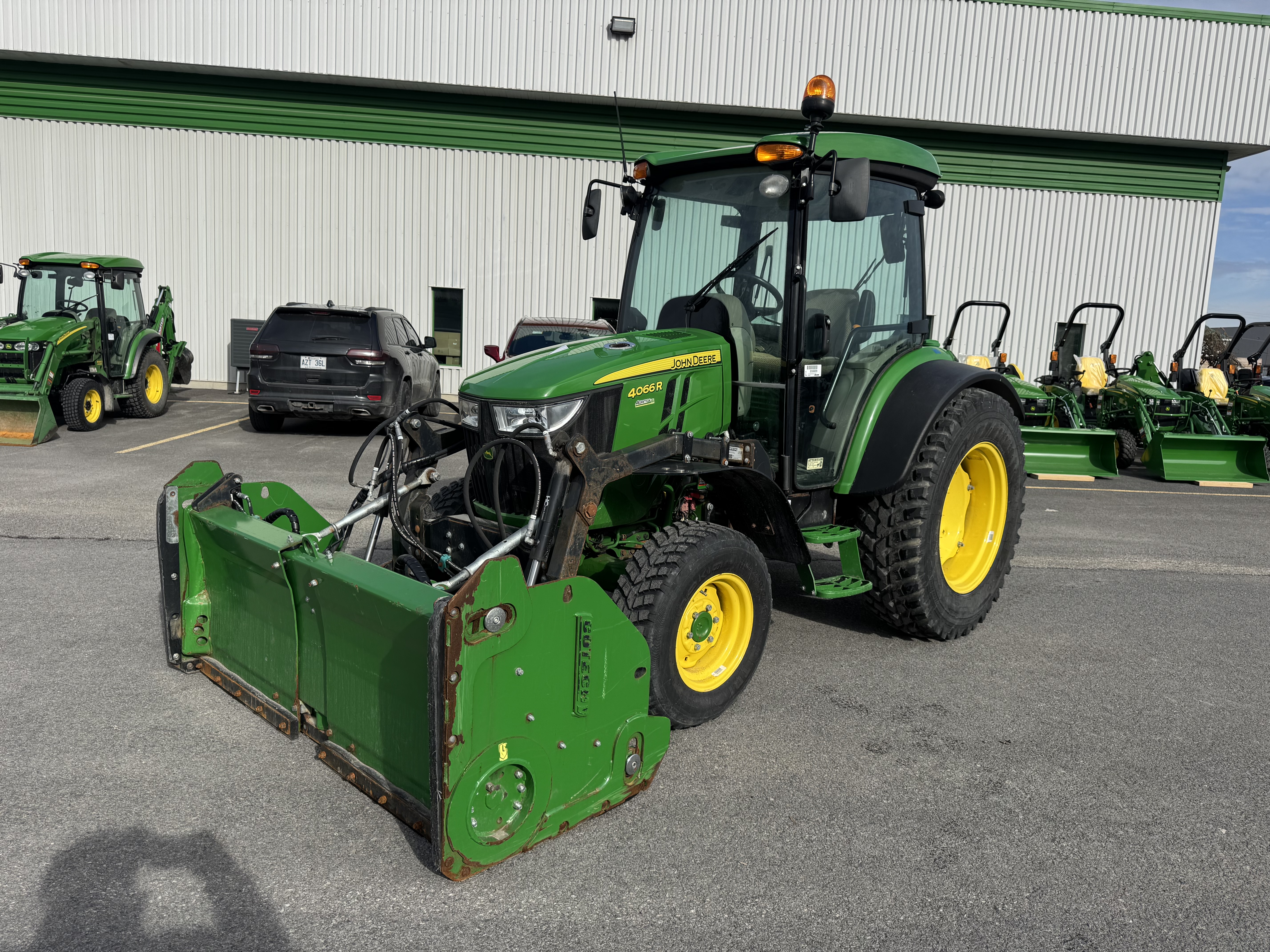 John Deere 4066R GRATTE NOKIAN    