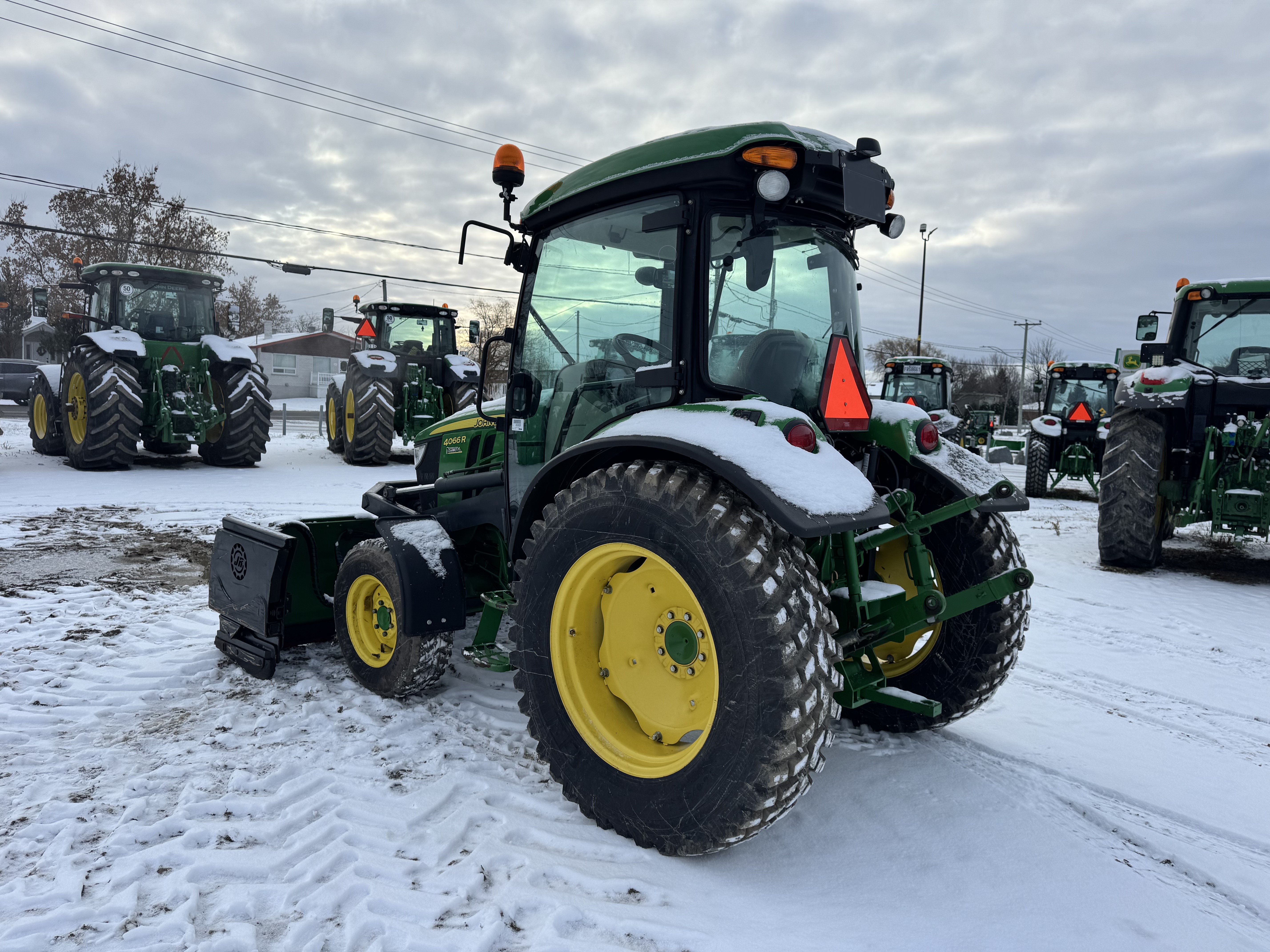 John Deere 4066R GRATTE NOKIAN    