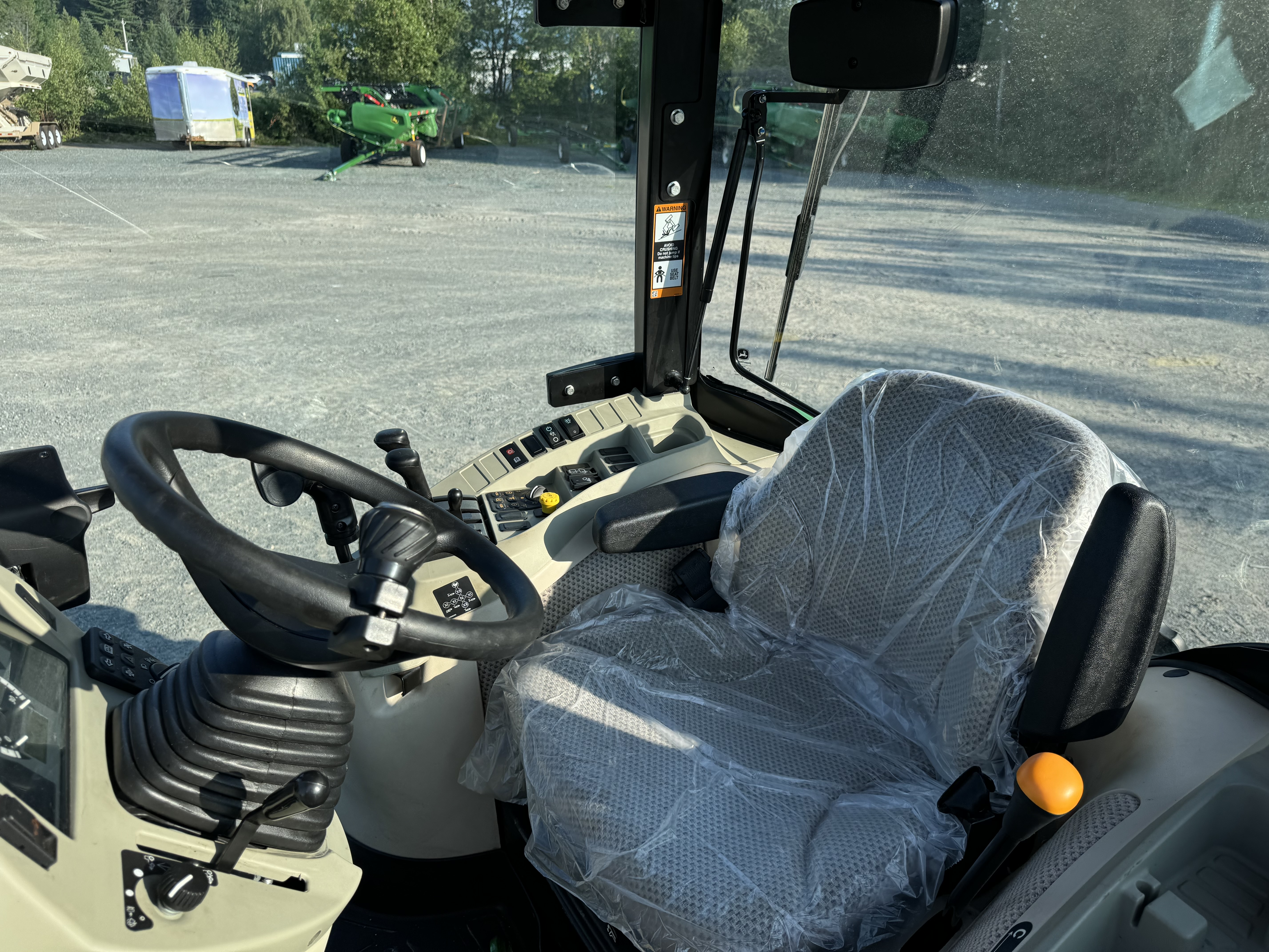 John Deere 4066R GRATTE NOKIAN  