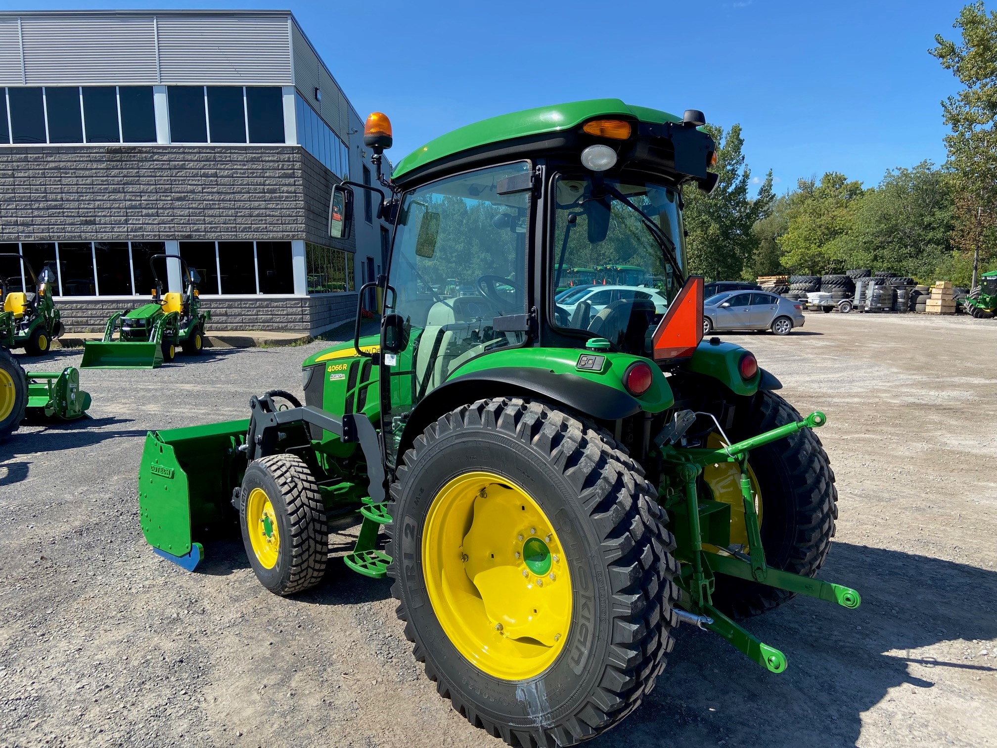 John Deere 4066R GRATTE NOKIAN  