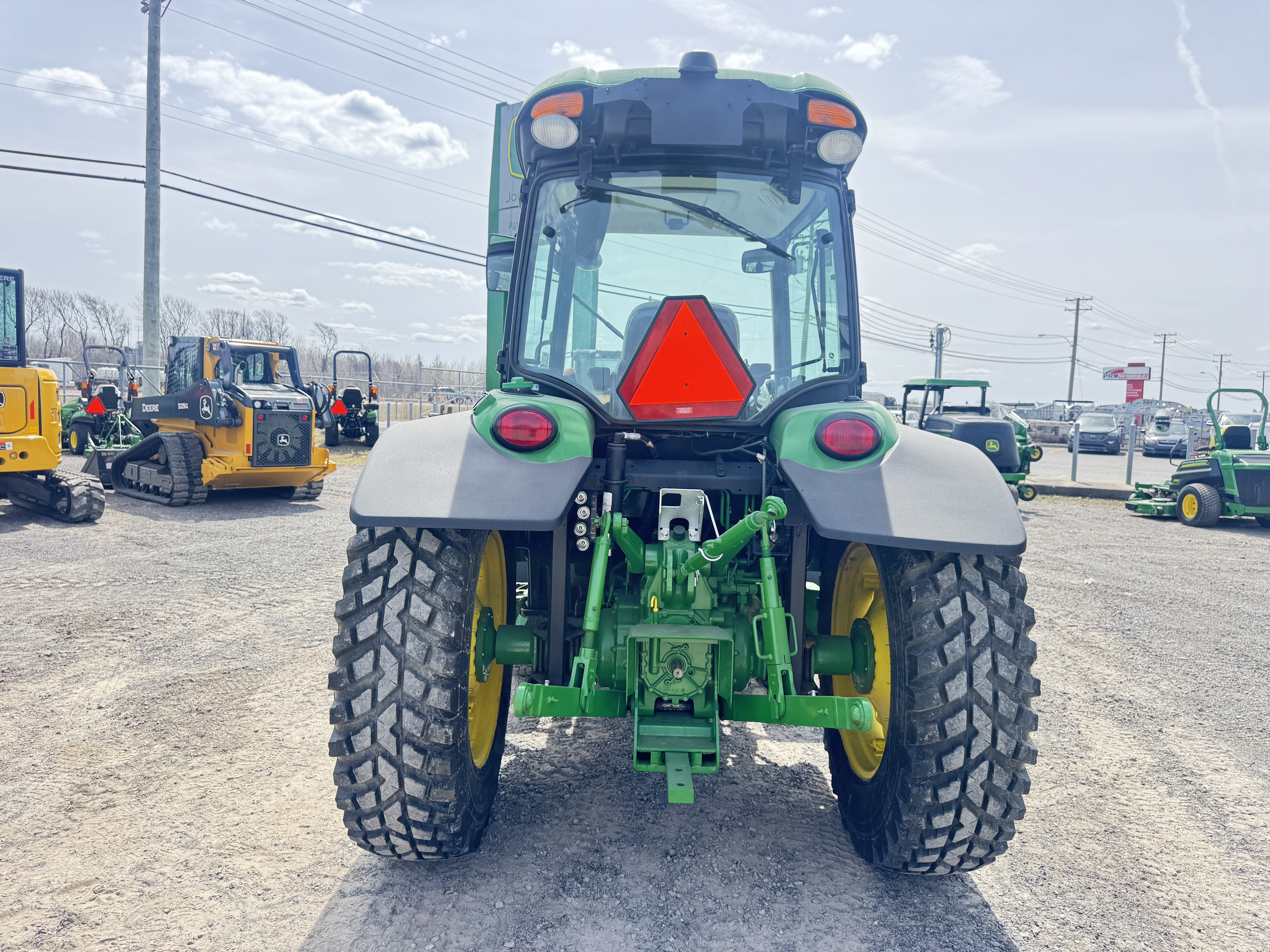 John Deere 4066R GRATTE NOKIAN    