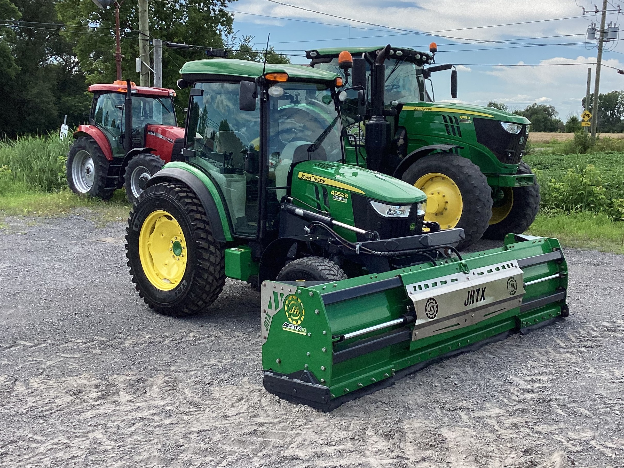 John Deere 4052R GRATTE NOKIAN 