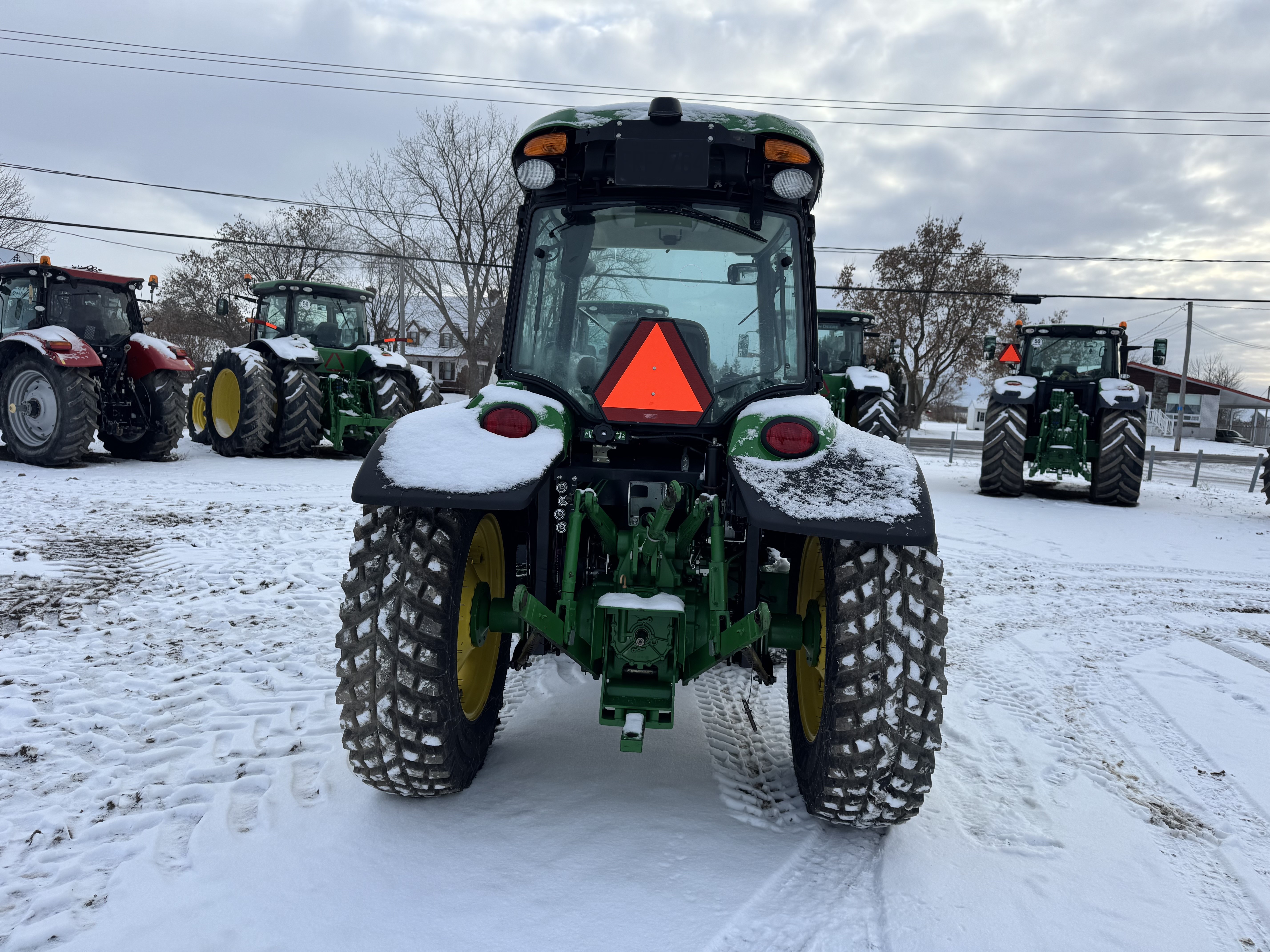 John Deere 4066R GRATTE NOKIAN    