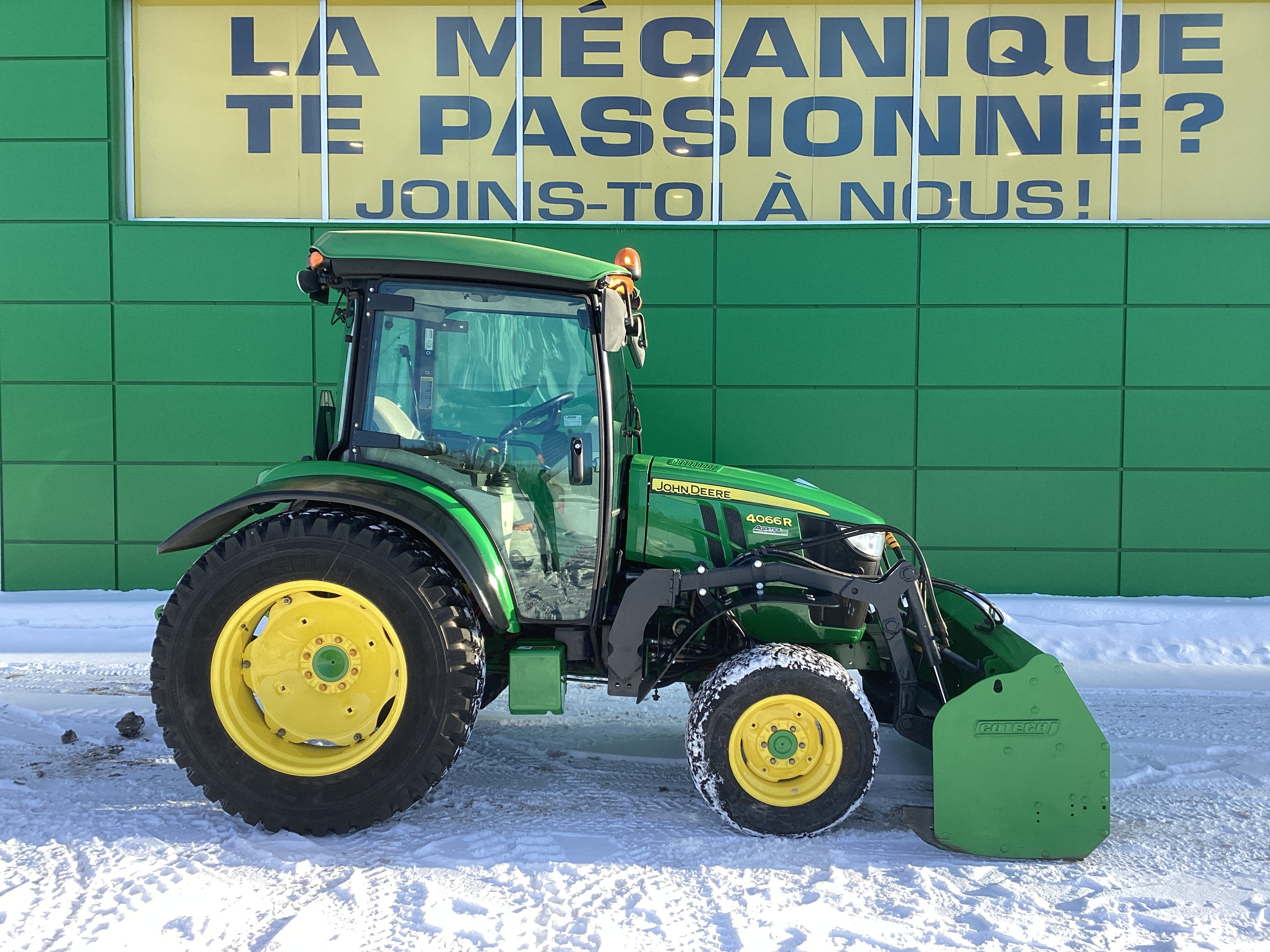 John Deere 4066R GRATTE NOKIAN    