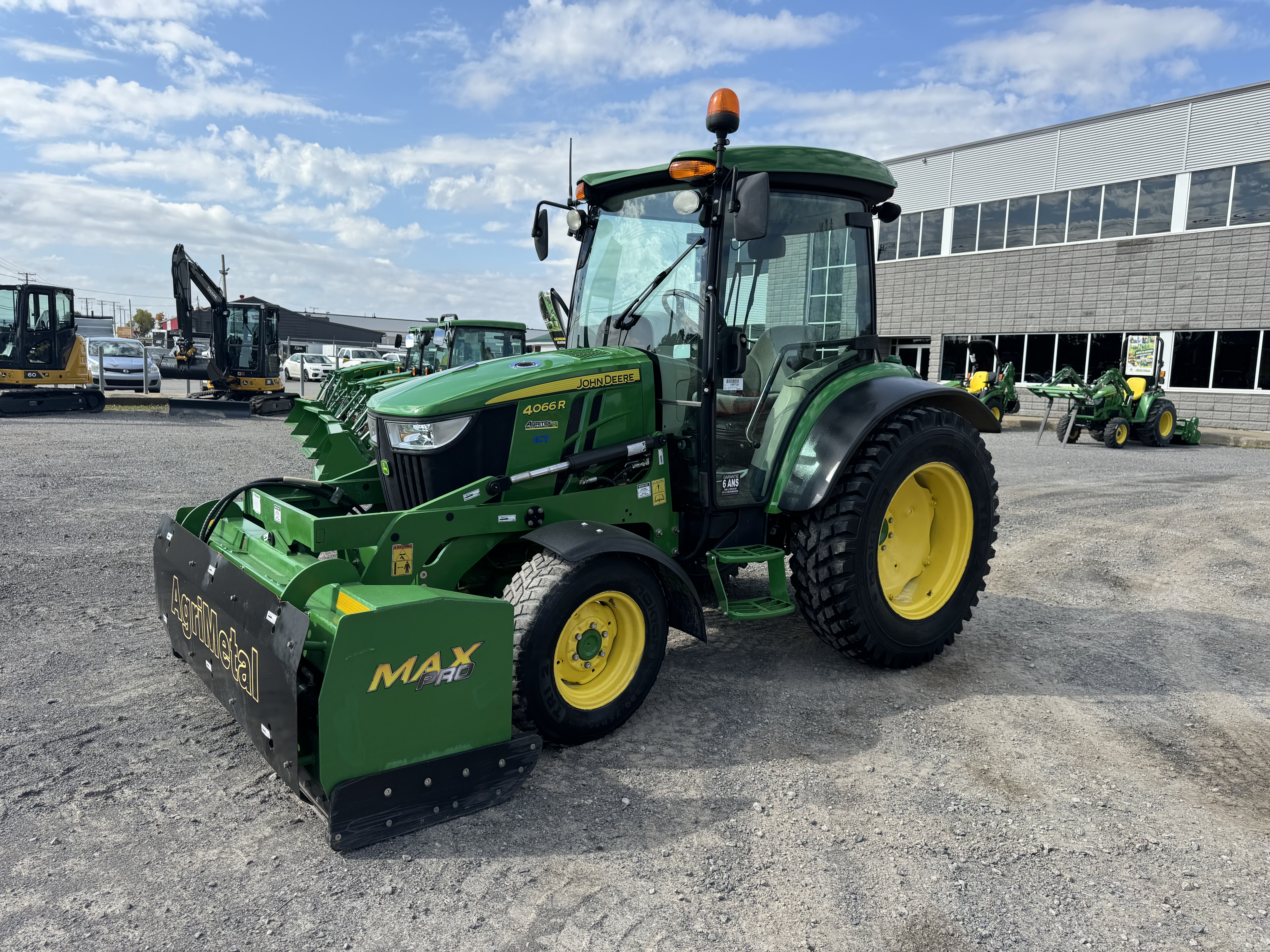 John Deere 4066R GRATTE NOKIAN 