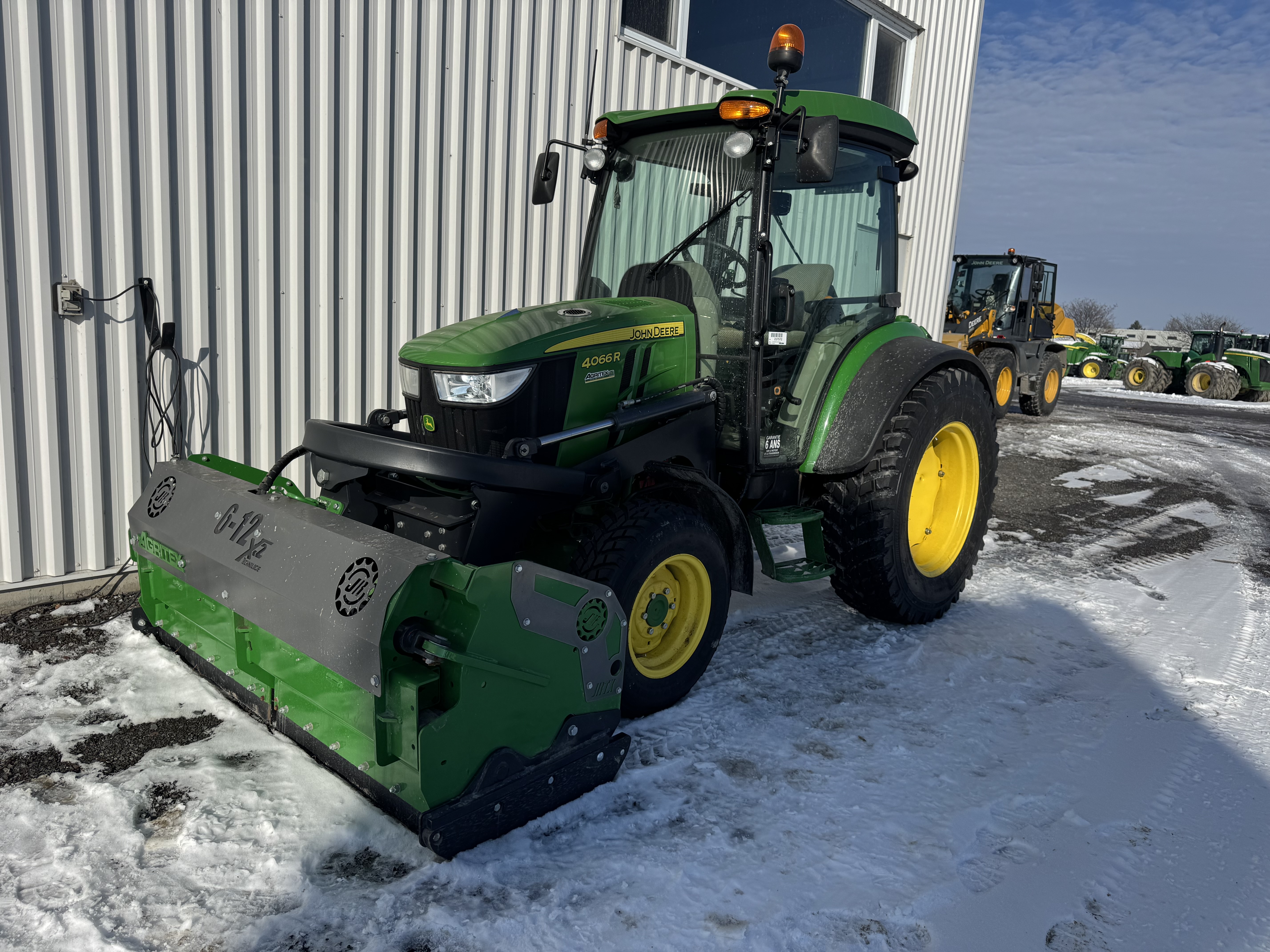 John Deere 4066R GRATTE NOKIAN    