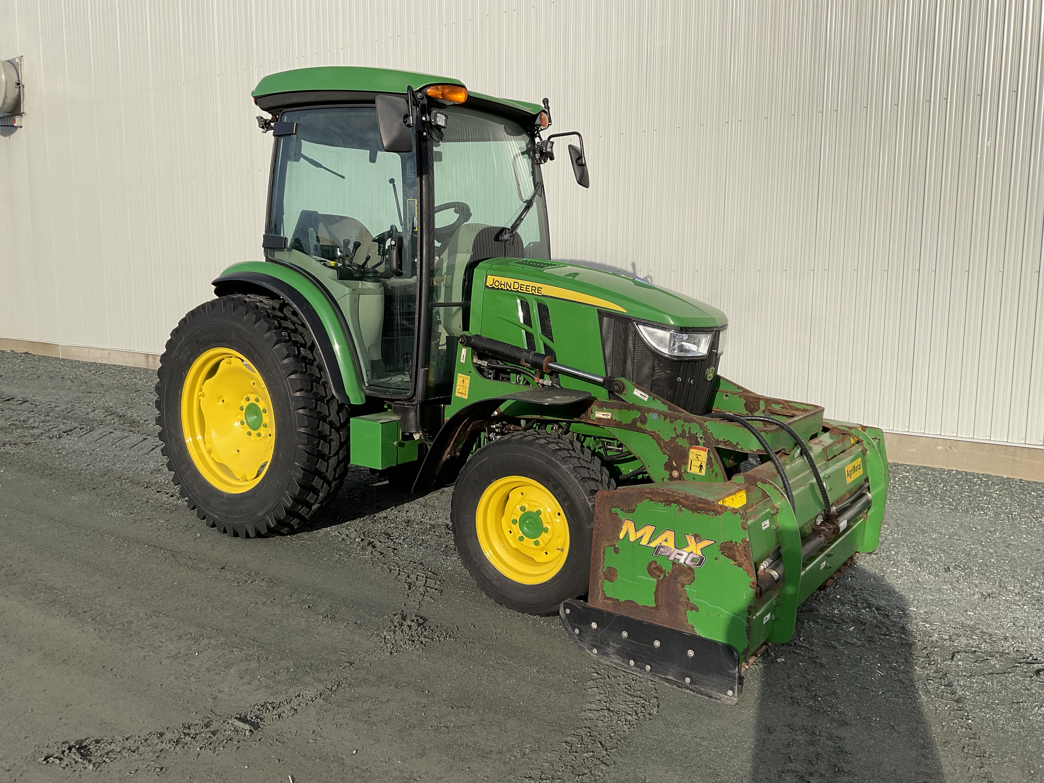 John Deere 4066R GRATTE NOKIAN 