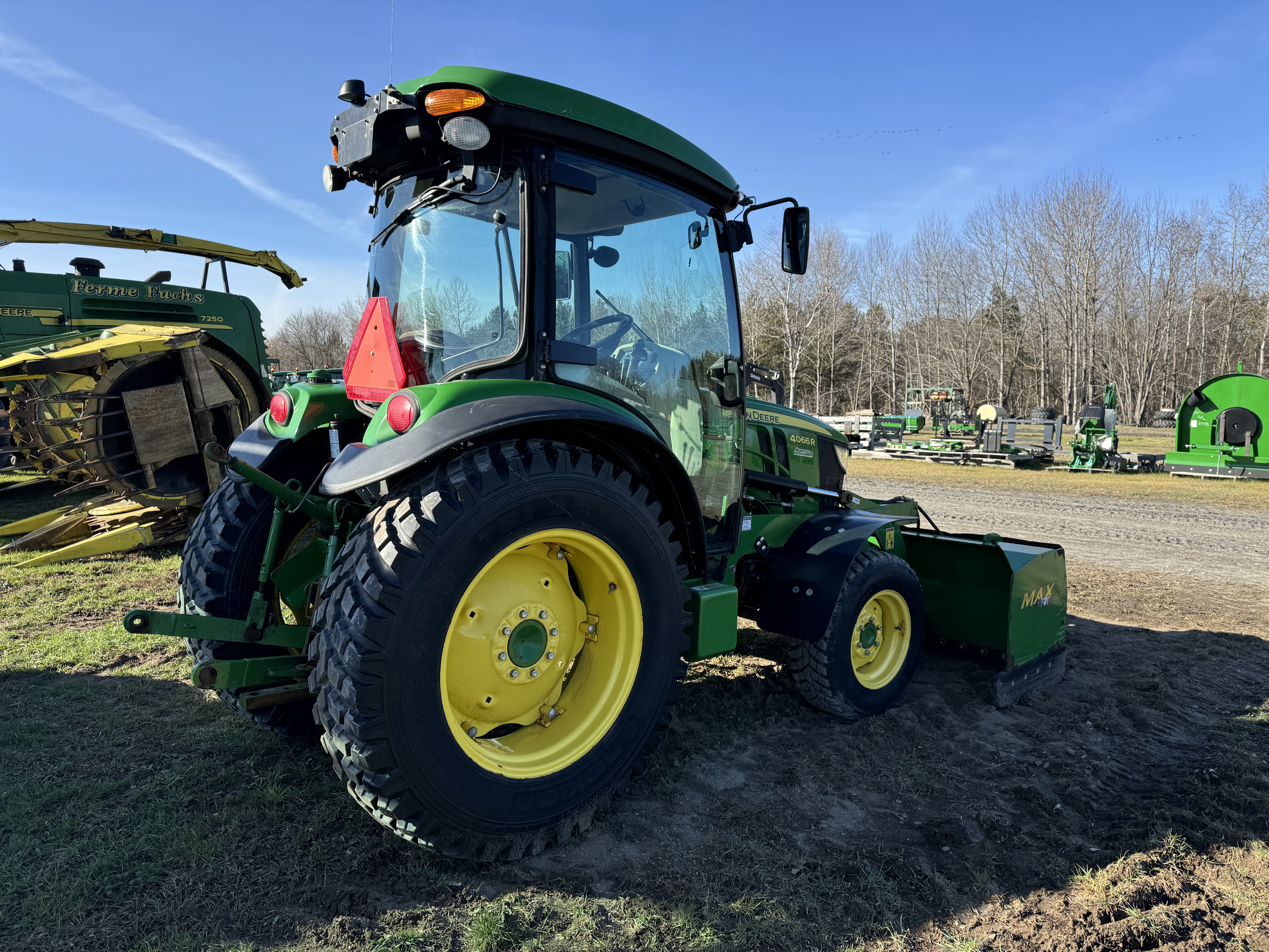 John Deere 4066R GRATTE NOKIAN    