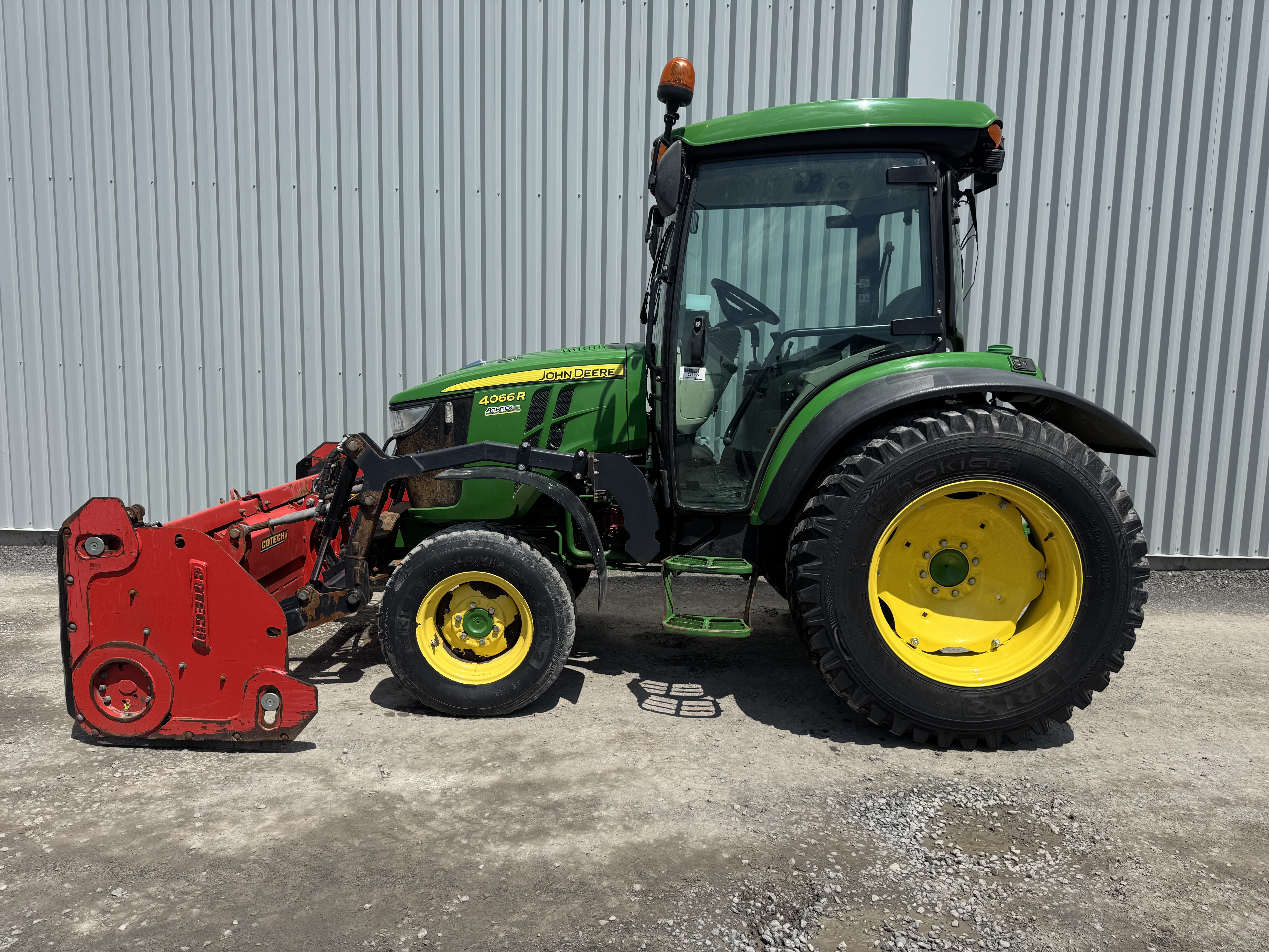 John Deere 4066R GRATTE NOKIAN    