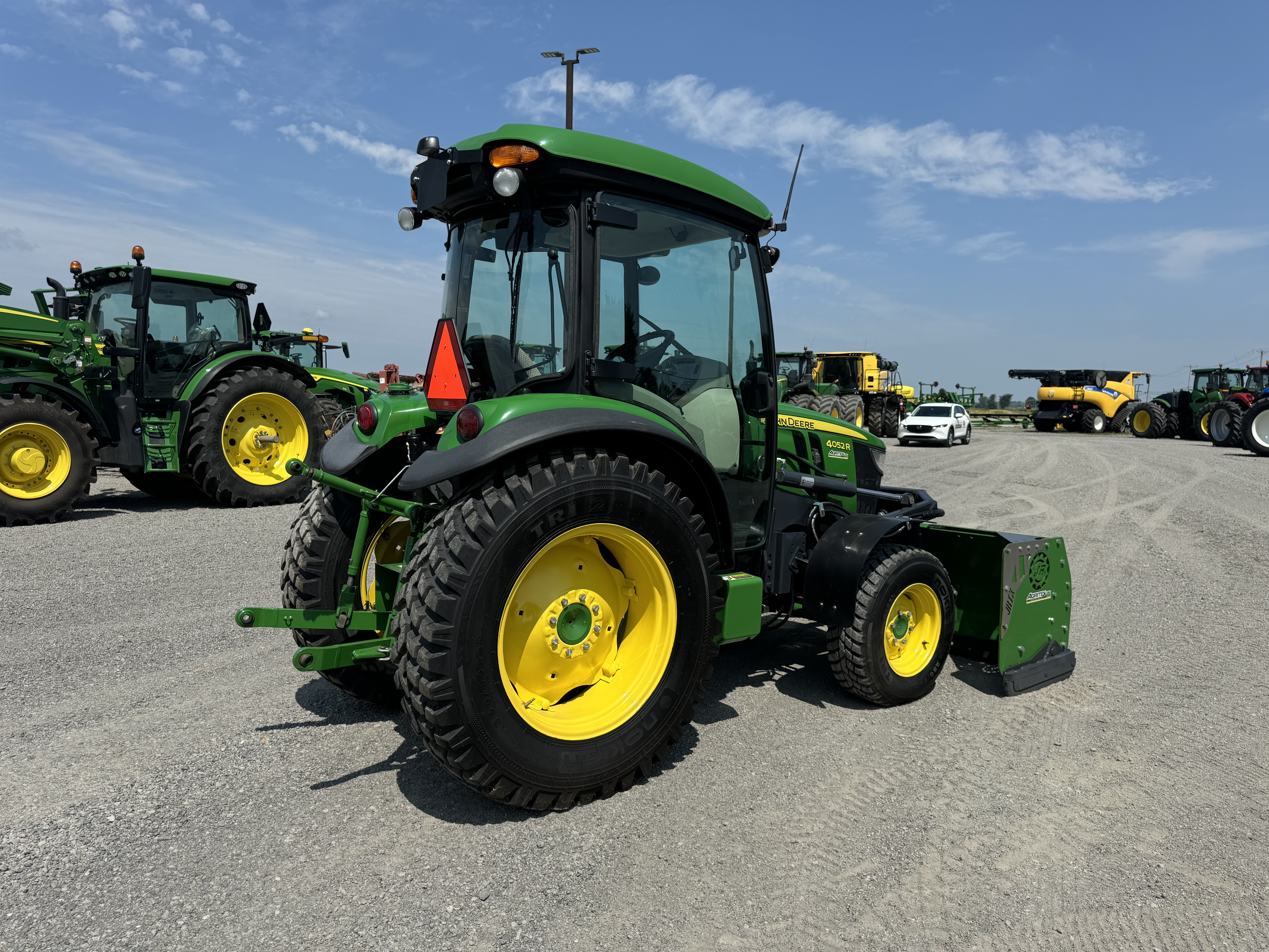 John Deere 4052R GRATTE NOKIAN  