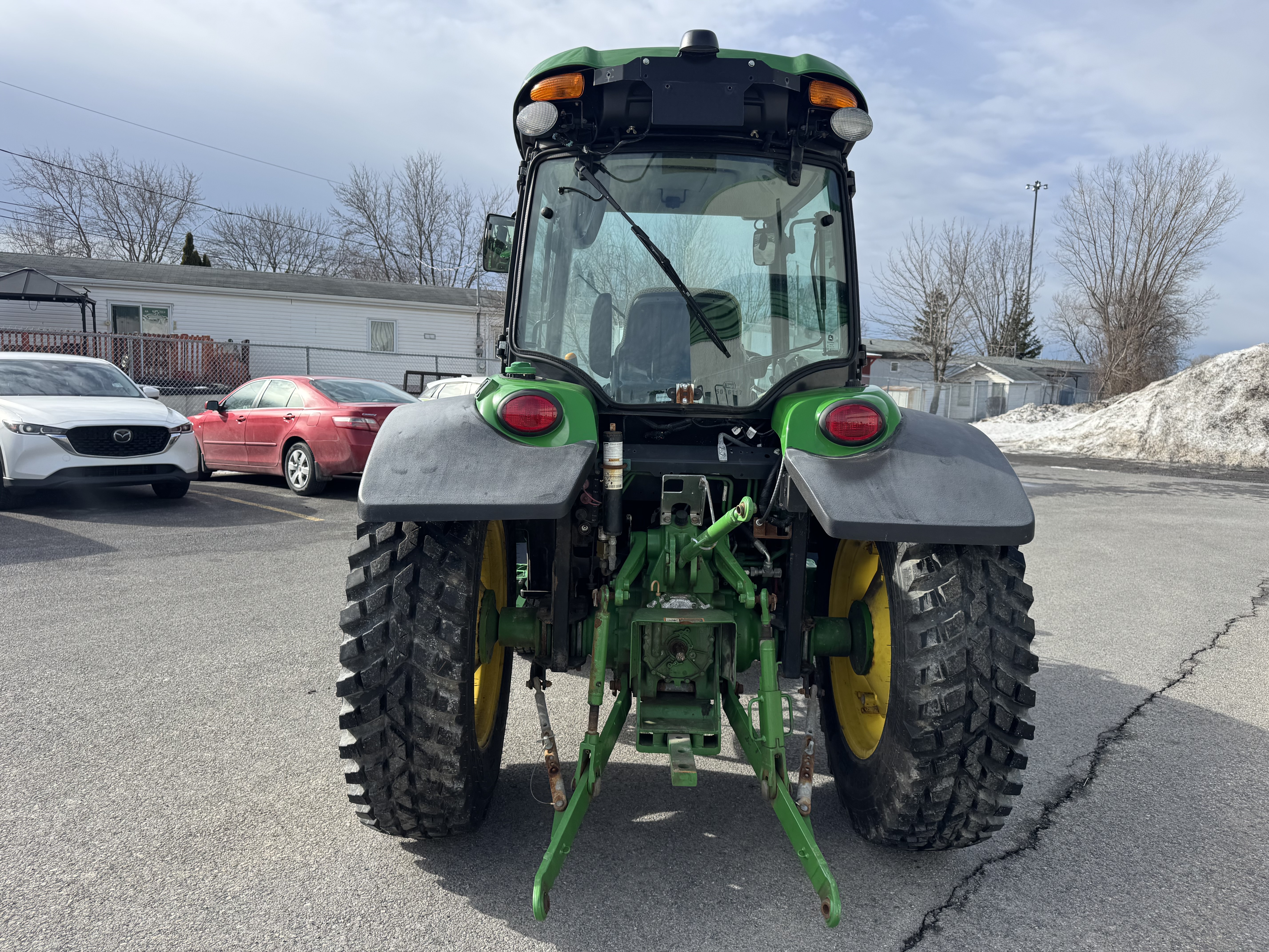 John Deere 4066R GRATTE NOKIAN    