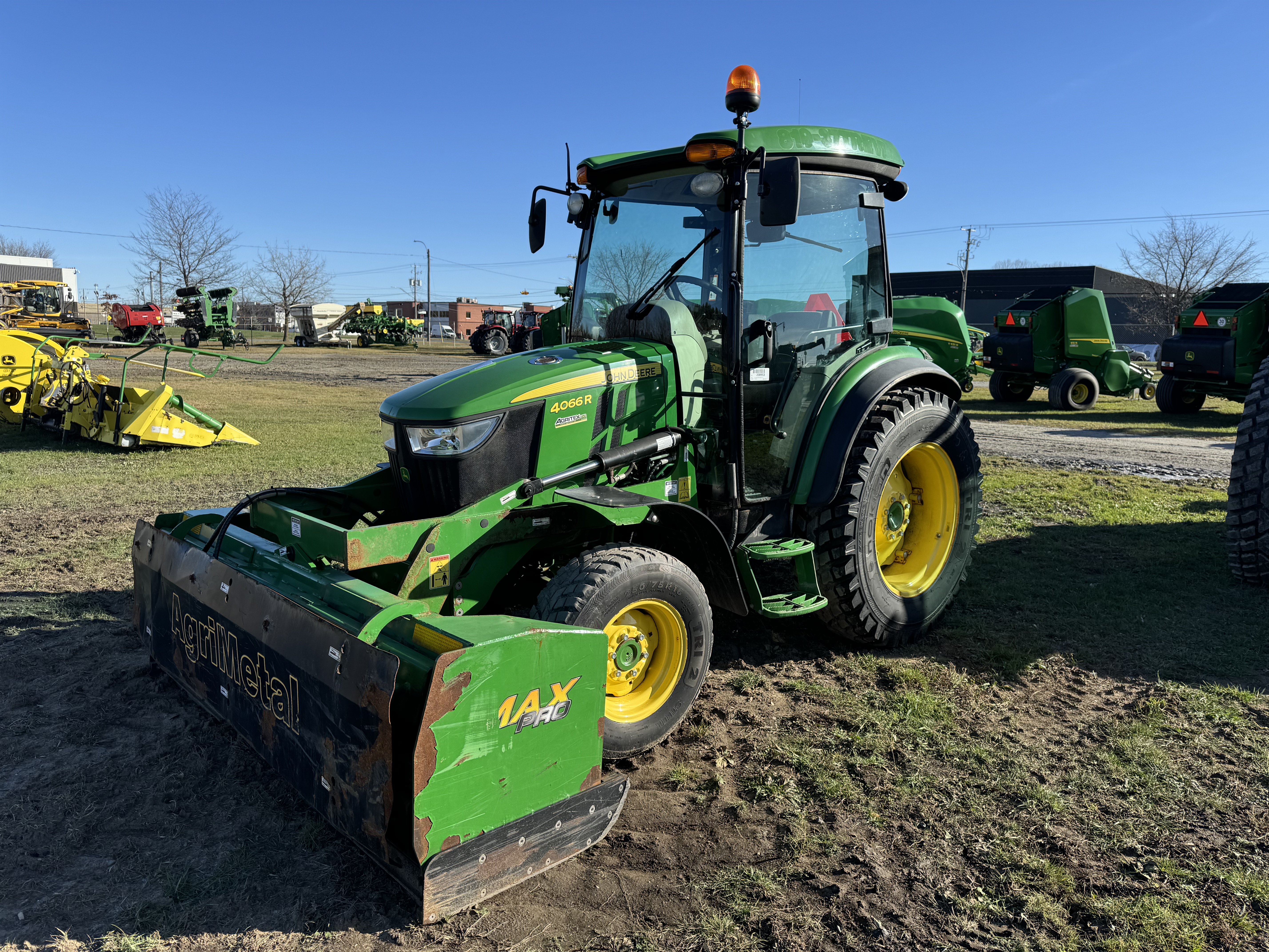 John Deere 4066R GRATTE NOKIAN    
