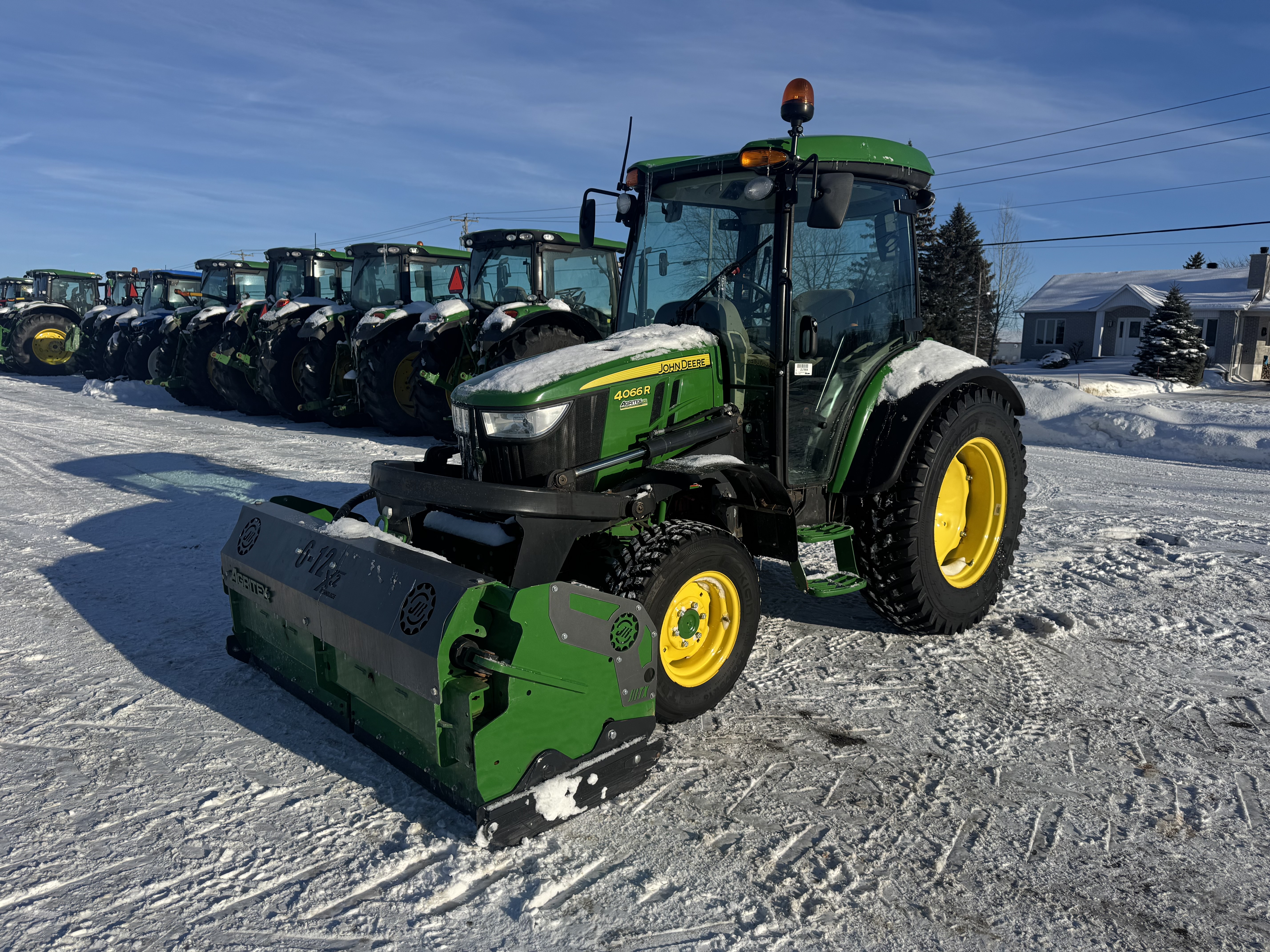John Deere 4066R GRATTE NOKIAN    