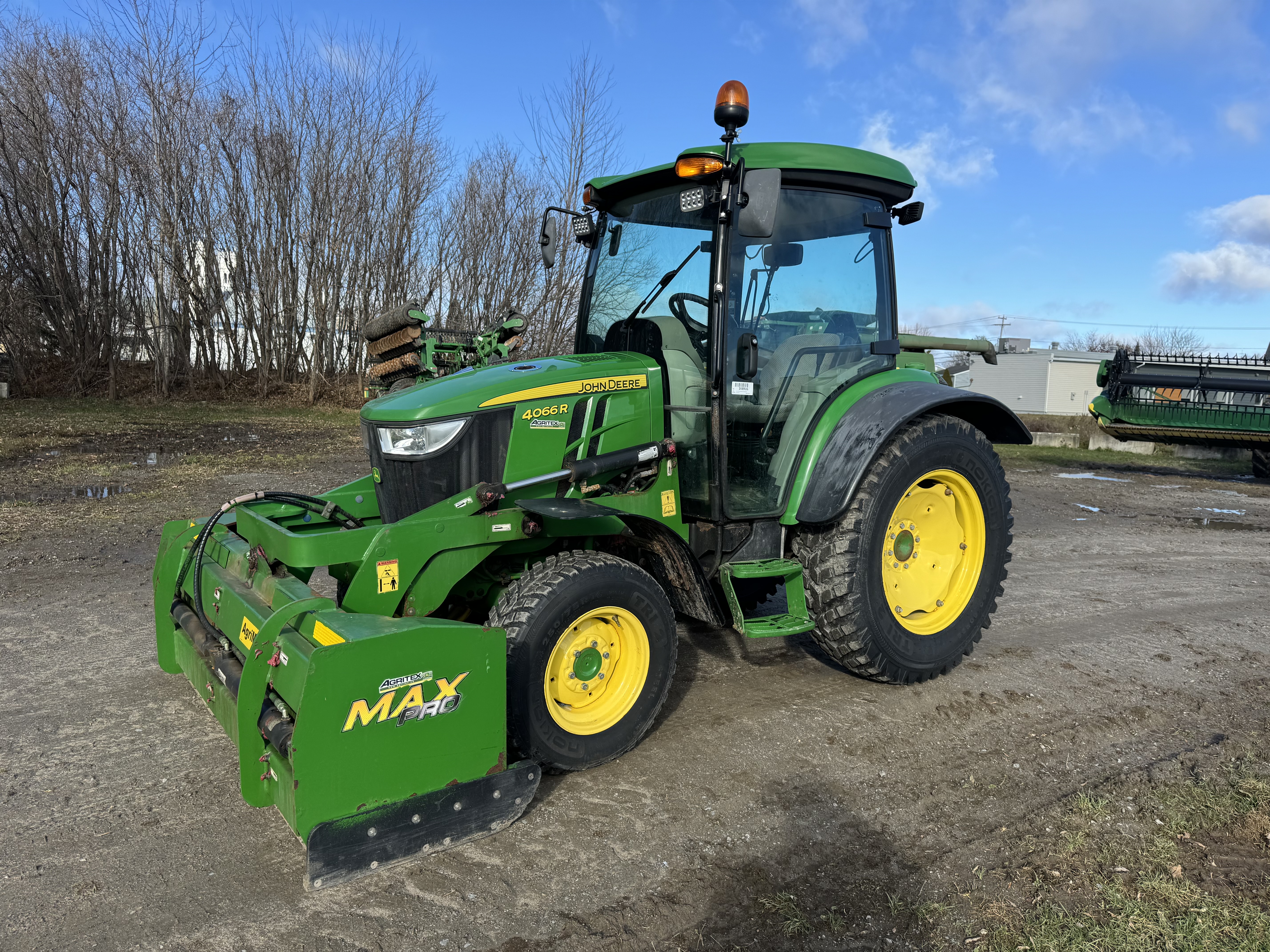 John Deere 4066R GRATTE NOKIAN  