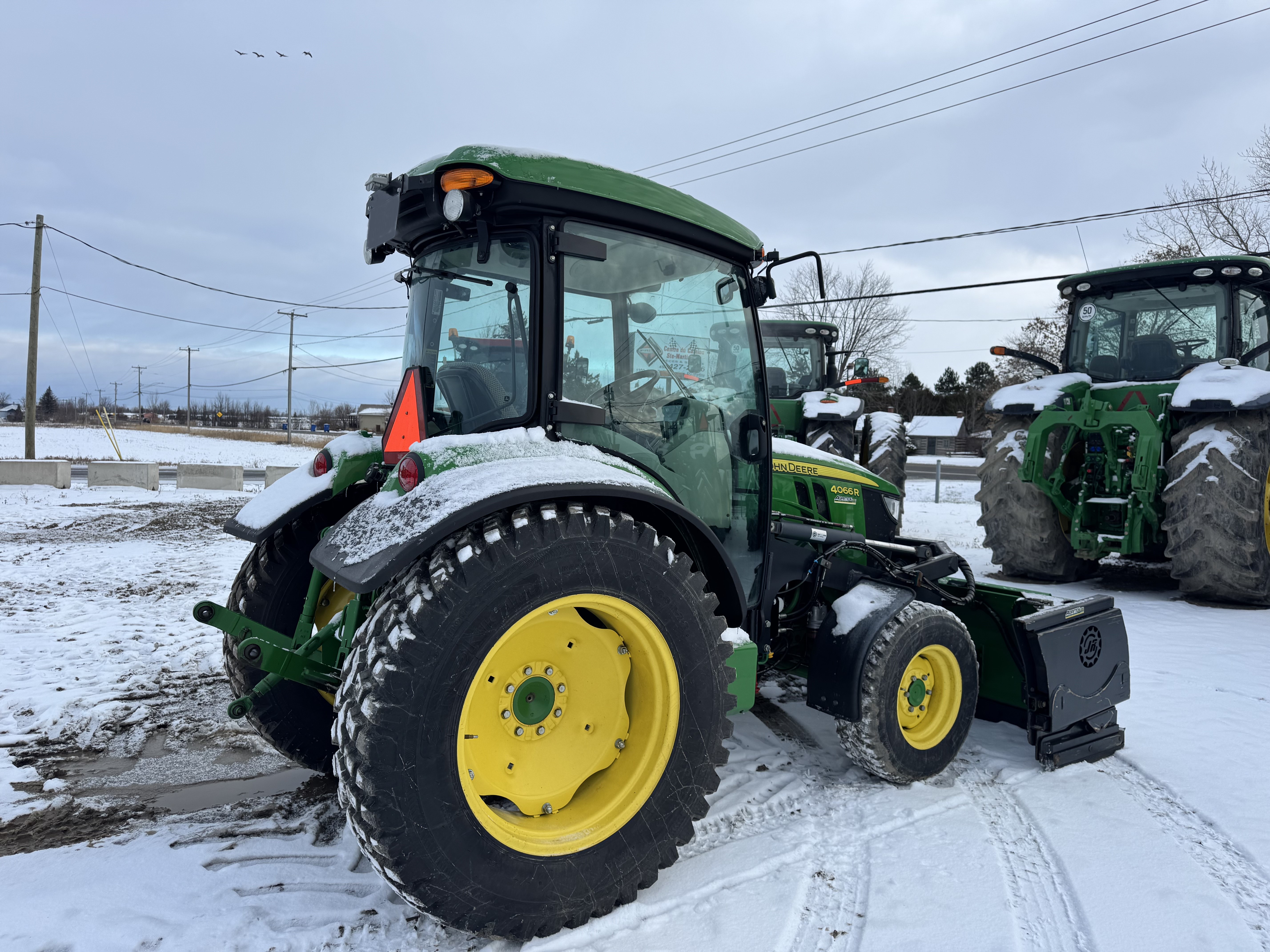 John Deere 4066R GRATTE NOKIAN    