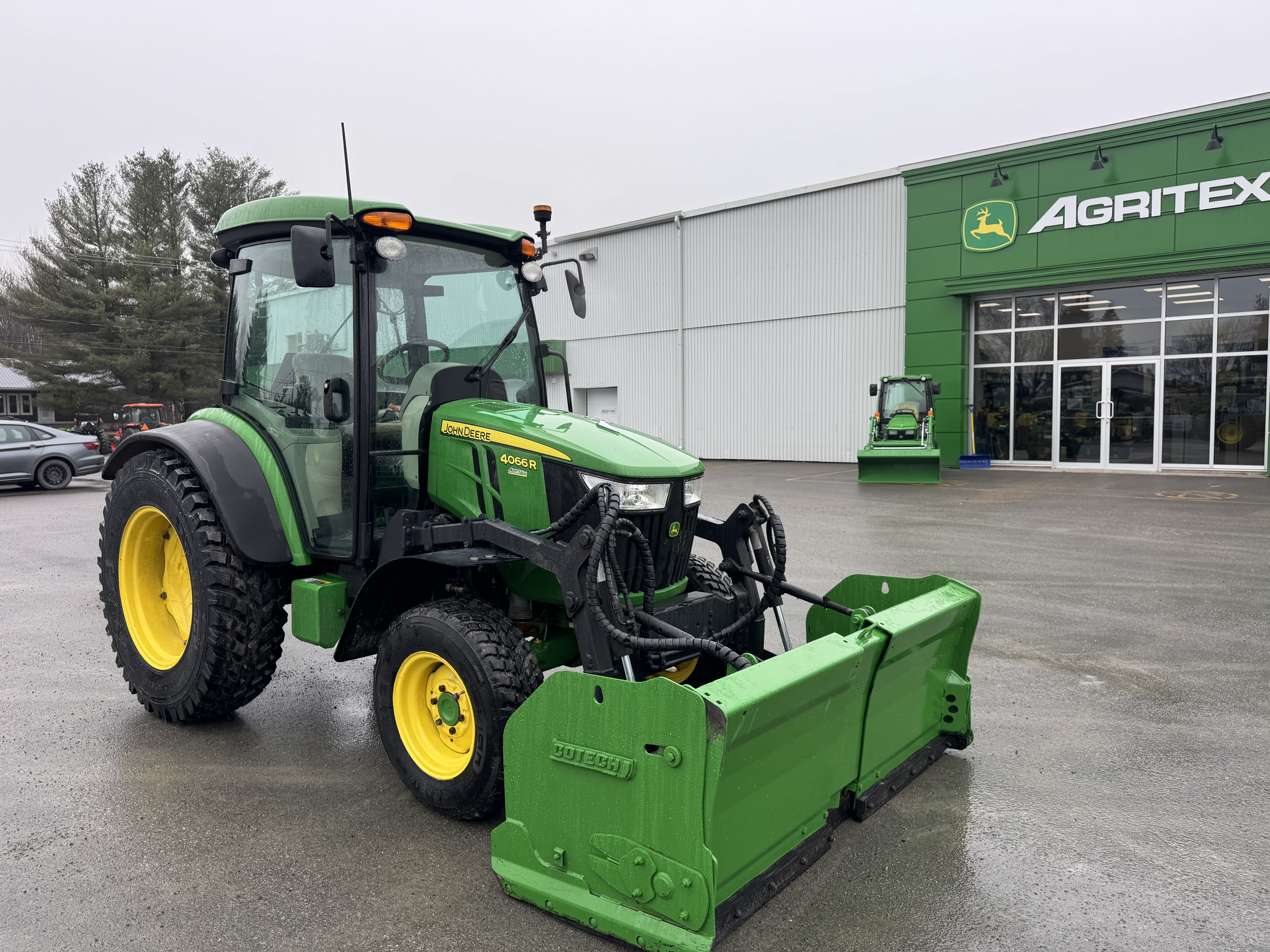 John Deere 4066R GRATTE NOKIAN    