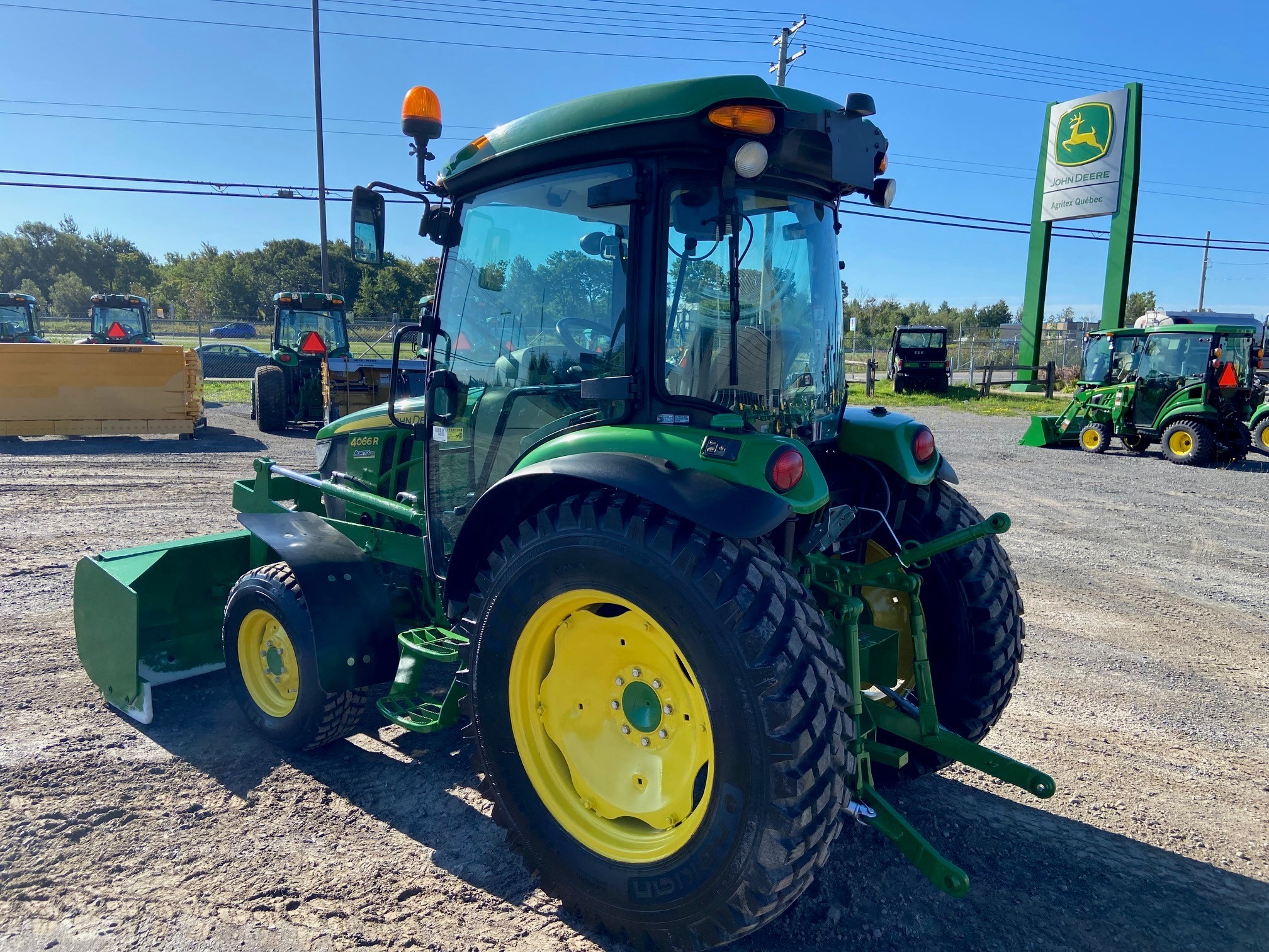 John Deere 4066R GRATTE NOKIAN  