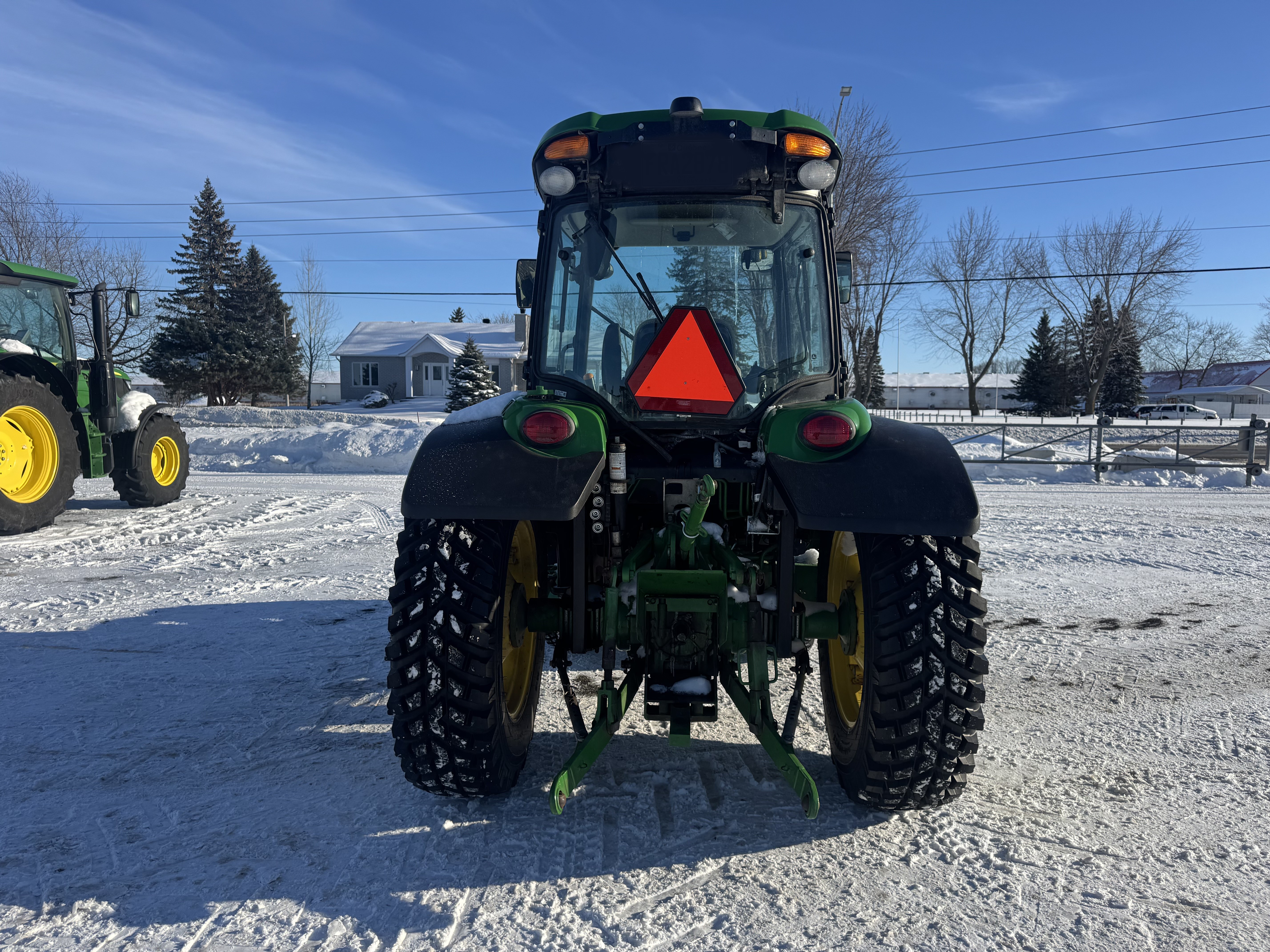 John Deere 4066R GRATTE NOKIAN    