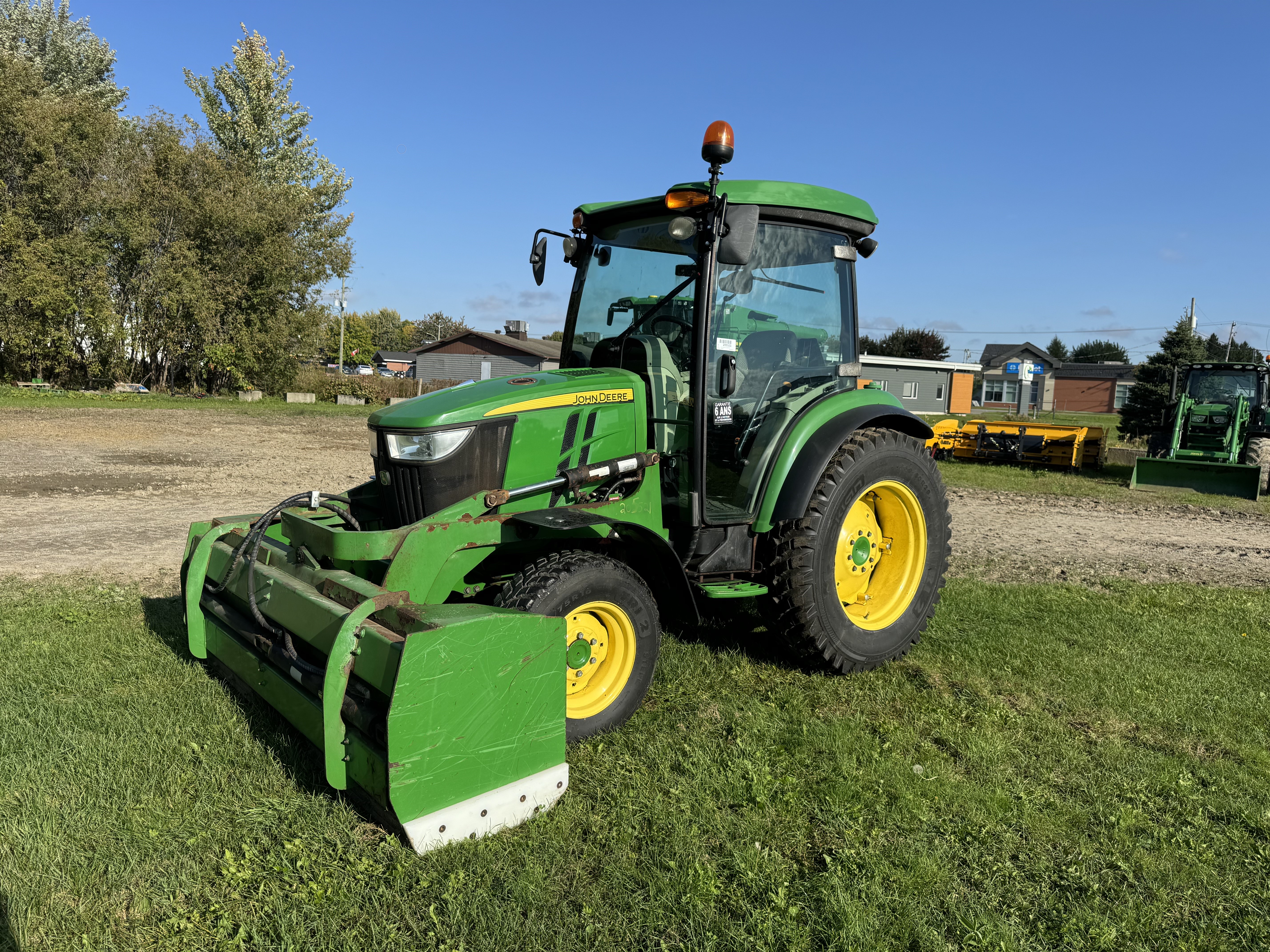 John Deere 4066R GRATTE NOKIAN    