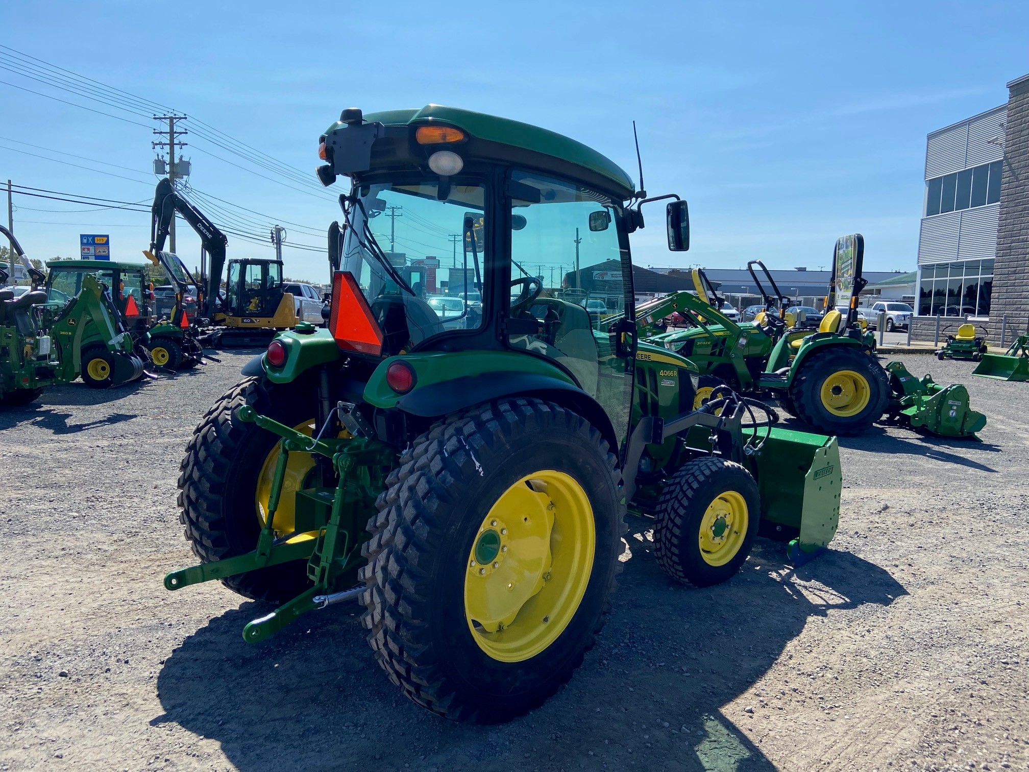 John Deere 4066R GRATTE NOKIAN  