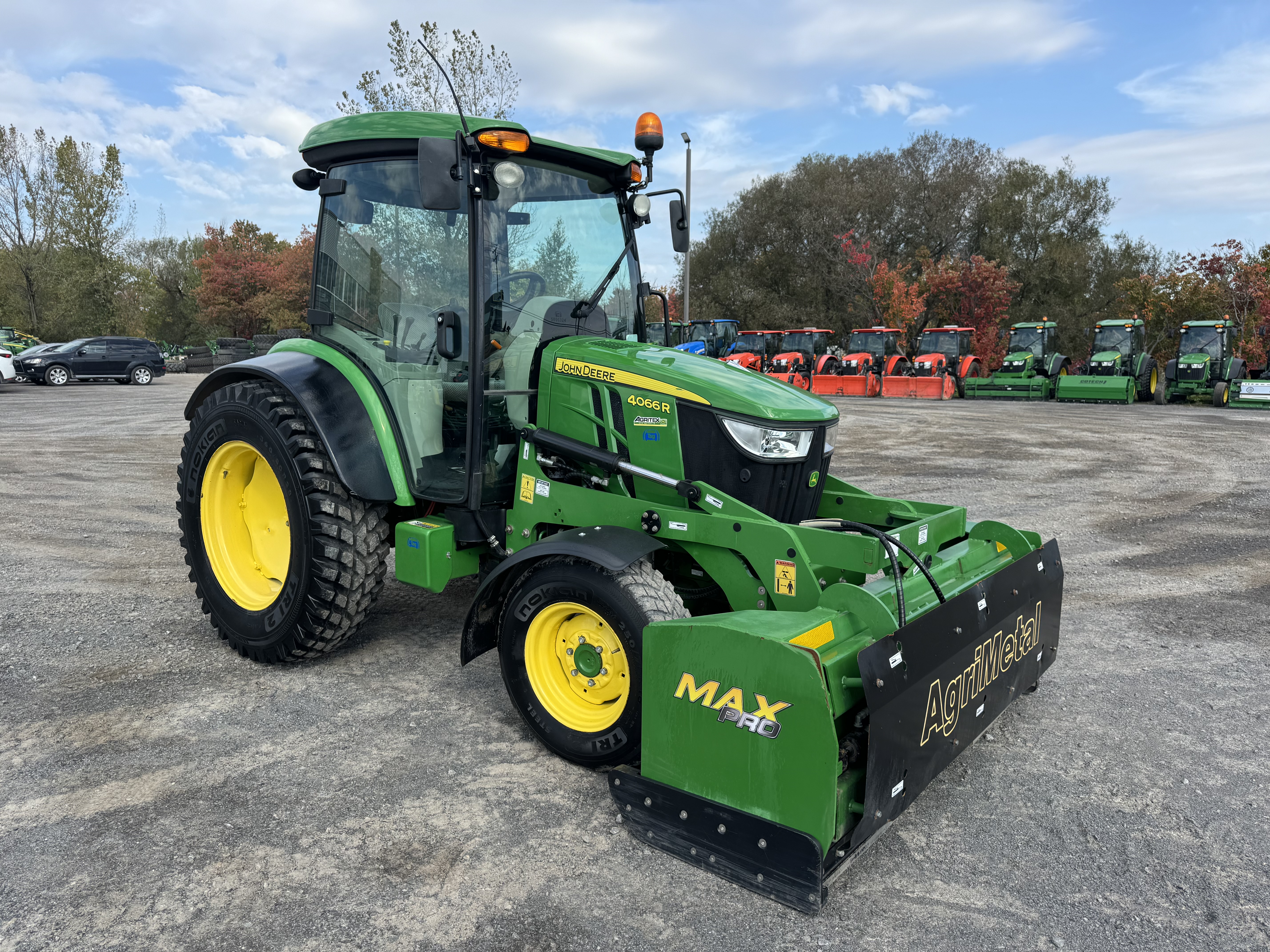 John Deere 4066R GRATTE NOKIAN 