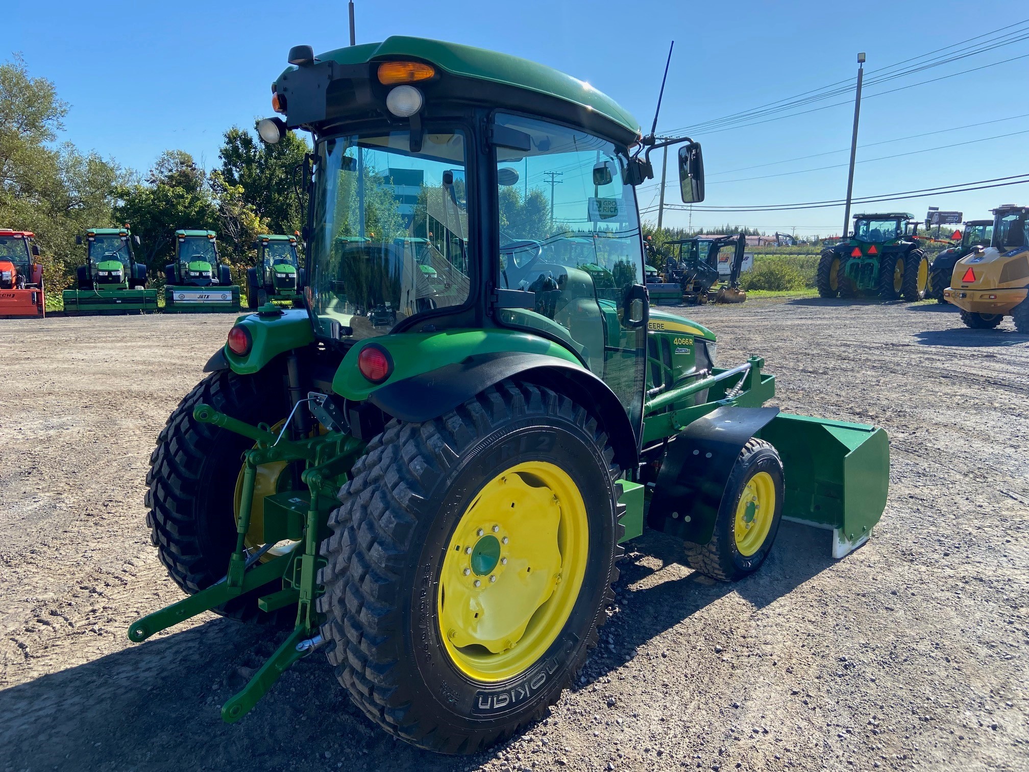 John Deere 4066R GRATTE NOKIAN  